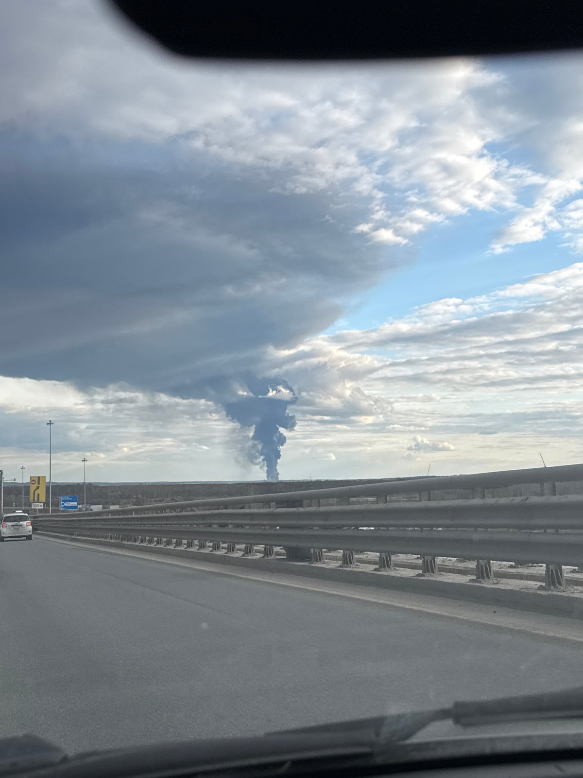 Highway travel documented under dramatic skies in Perm