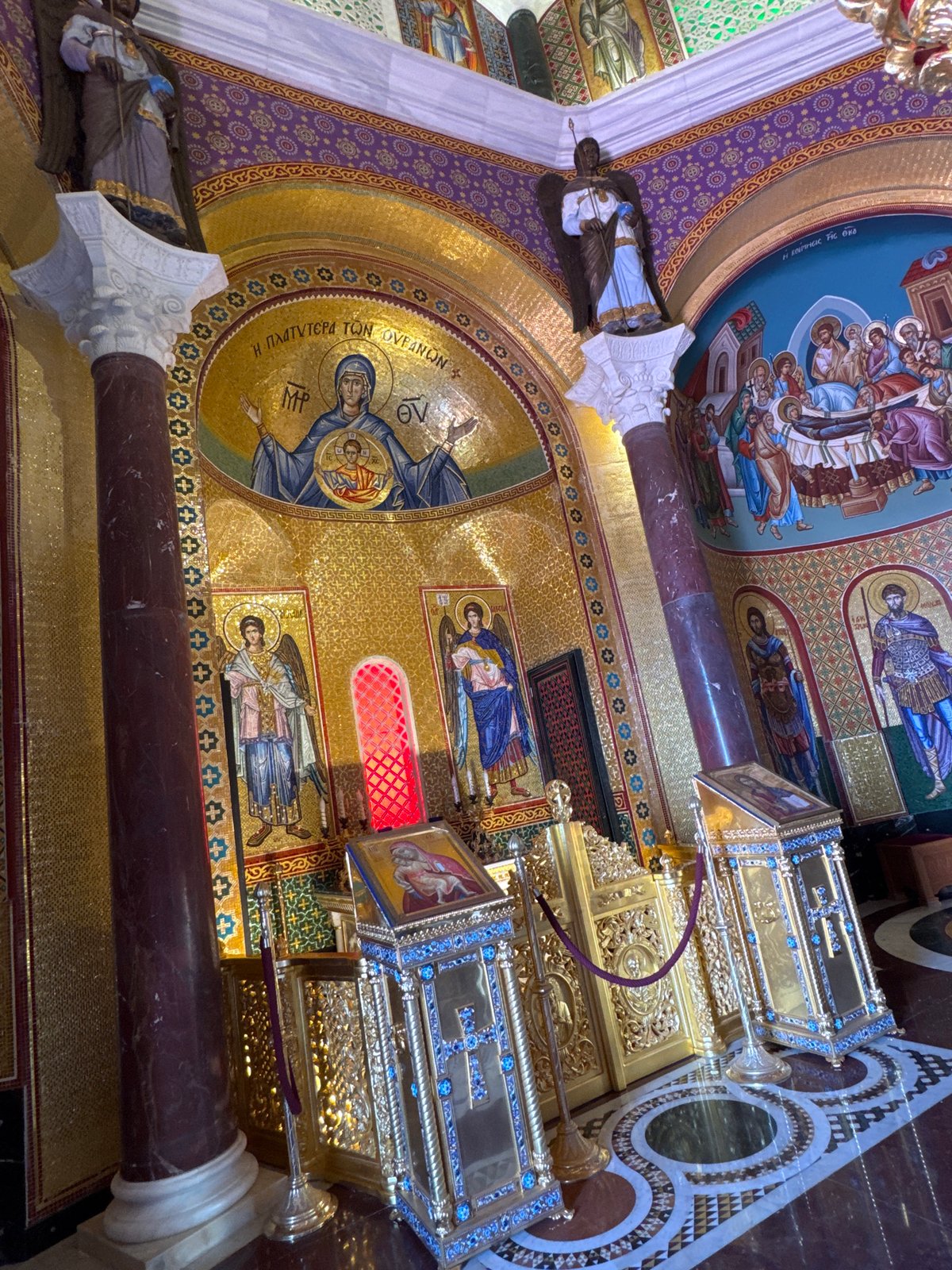 Visitor documents historic Cyprus monasteries and mountain landscape