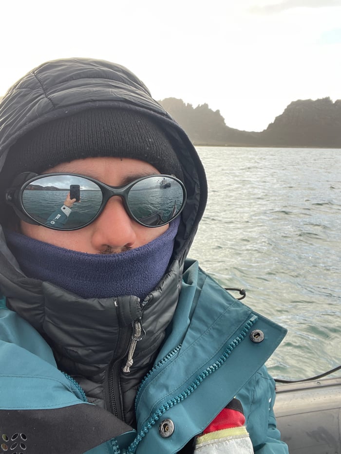 Tourist documents Antarctic research base visit with wildlife sightings