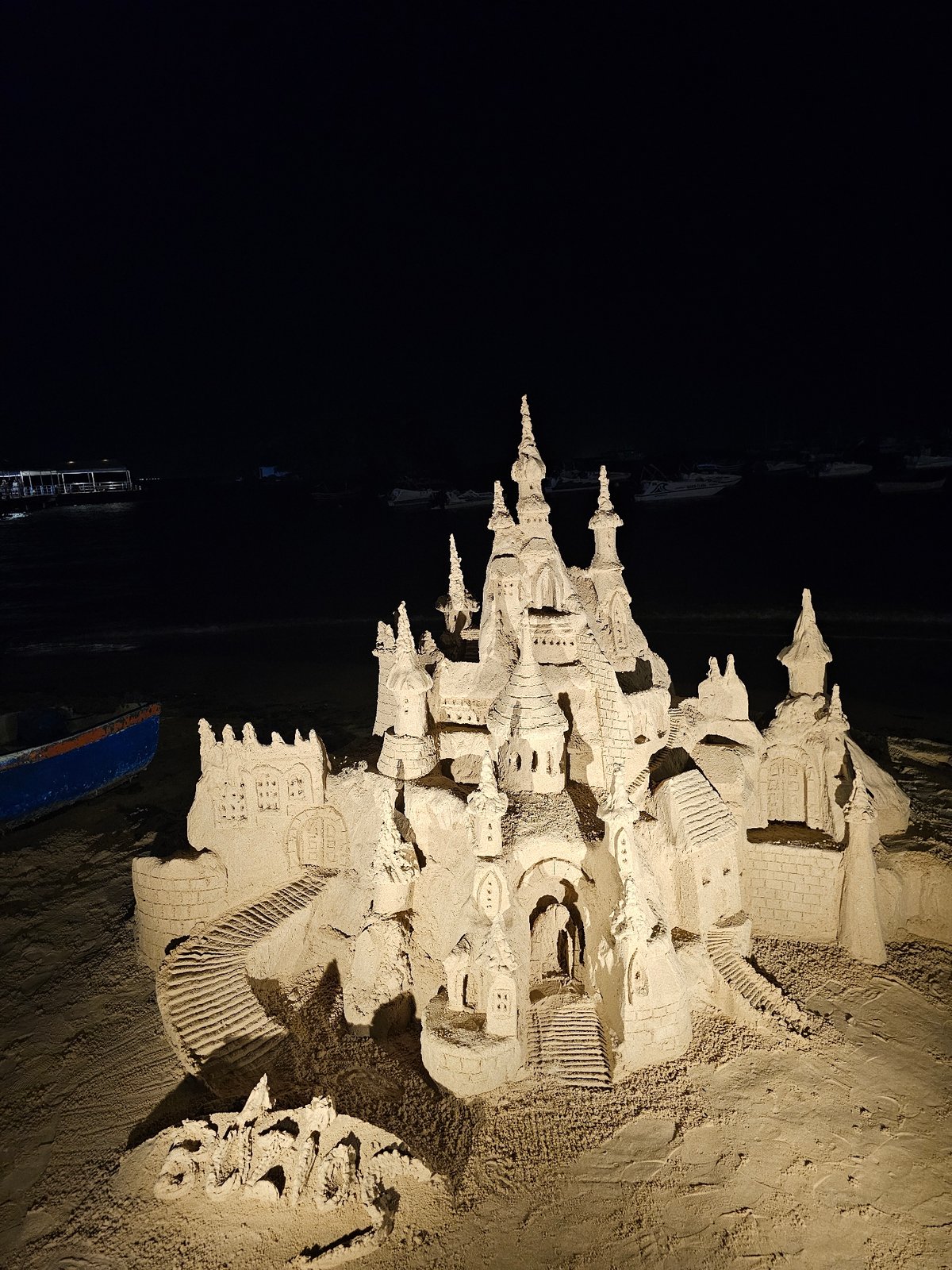 Night scenes in Armação Dos Búzios feature sandcastle, music performance