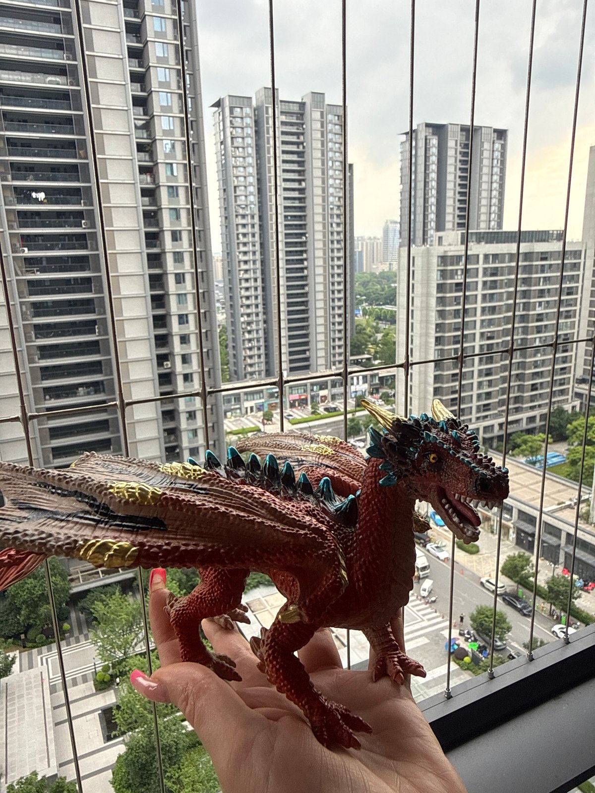 Collectible toys shown off against Yiwu's high-rise skyline