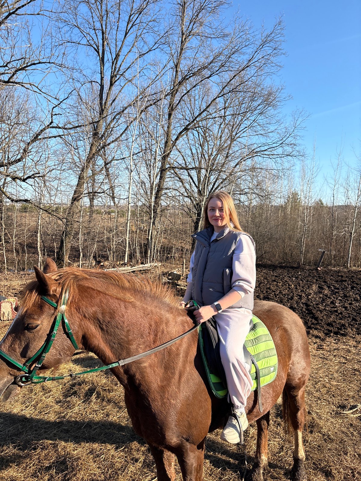 Horseback riding session documented in rural Noviy, Russia
