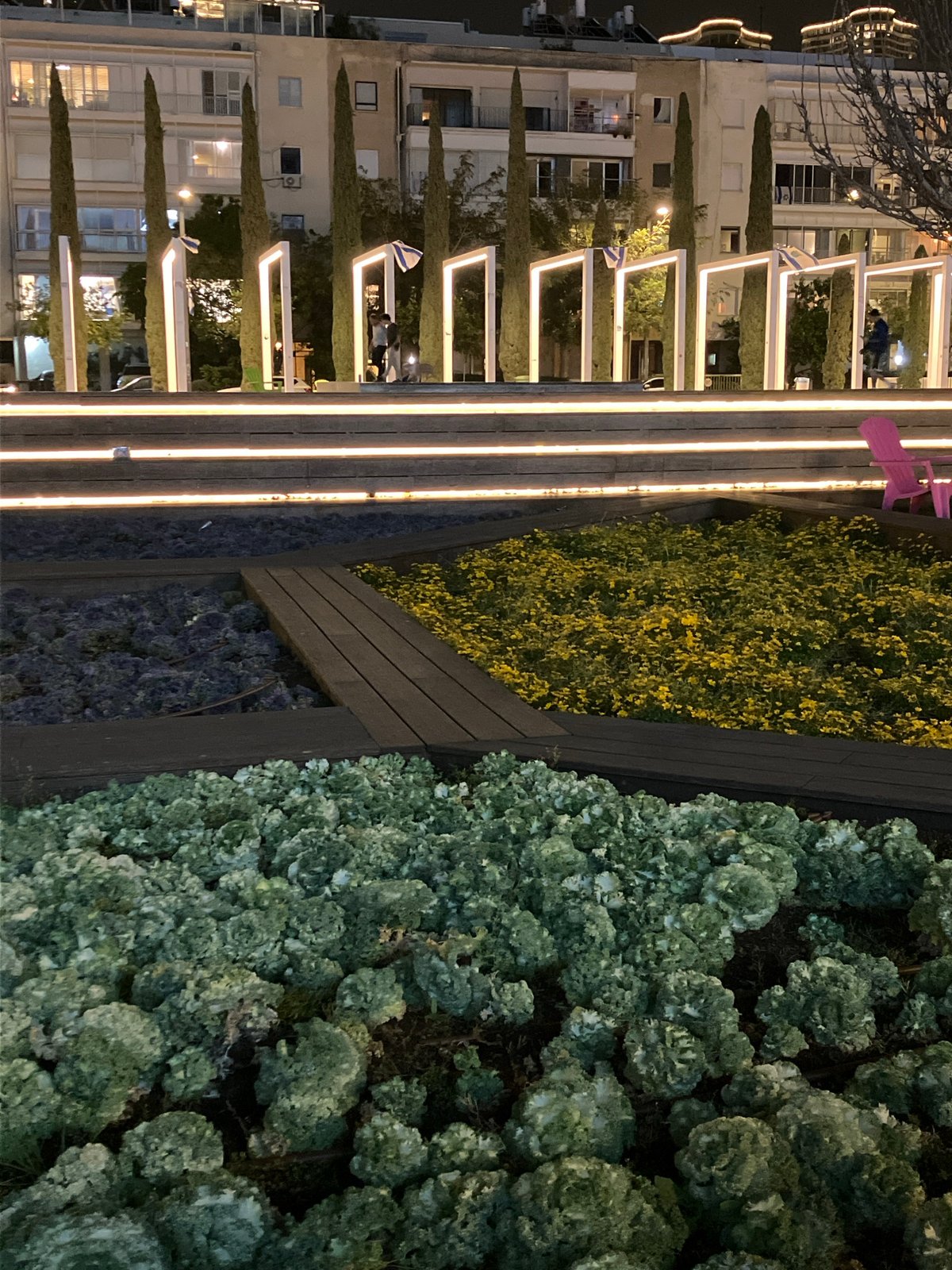 Marble statue observed in Tel Aviv park nighttime scene