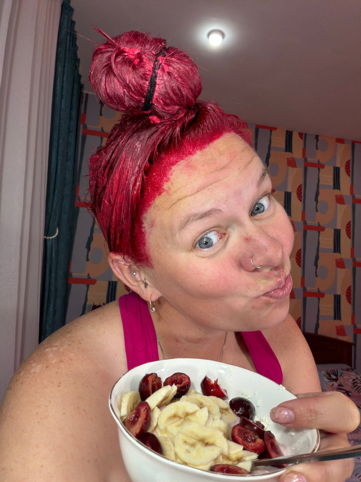 Person with fresh red hair dye photographed by witnesses