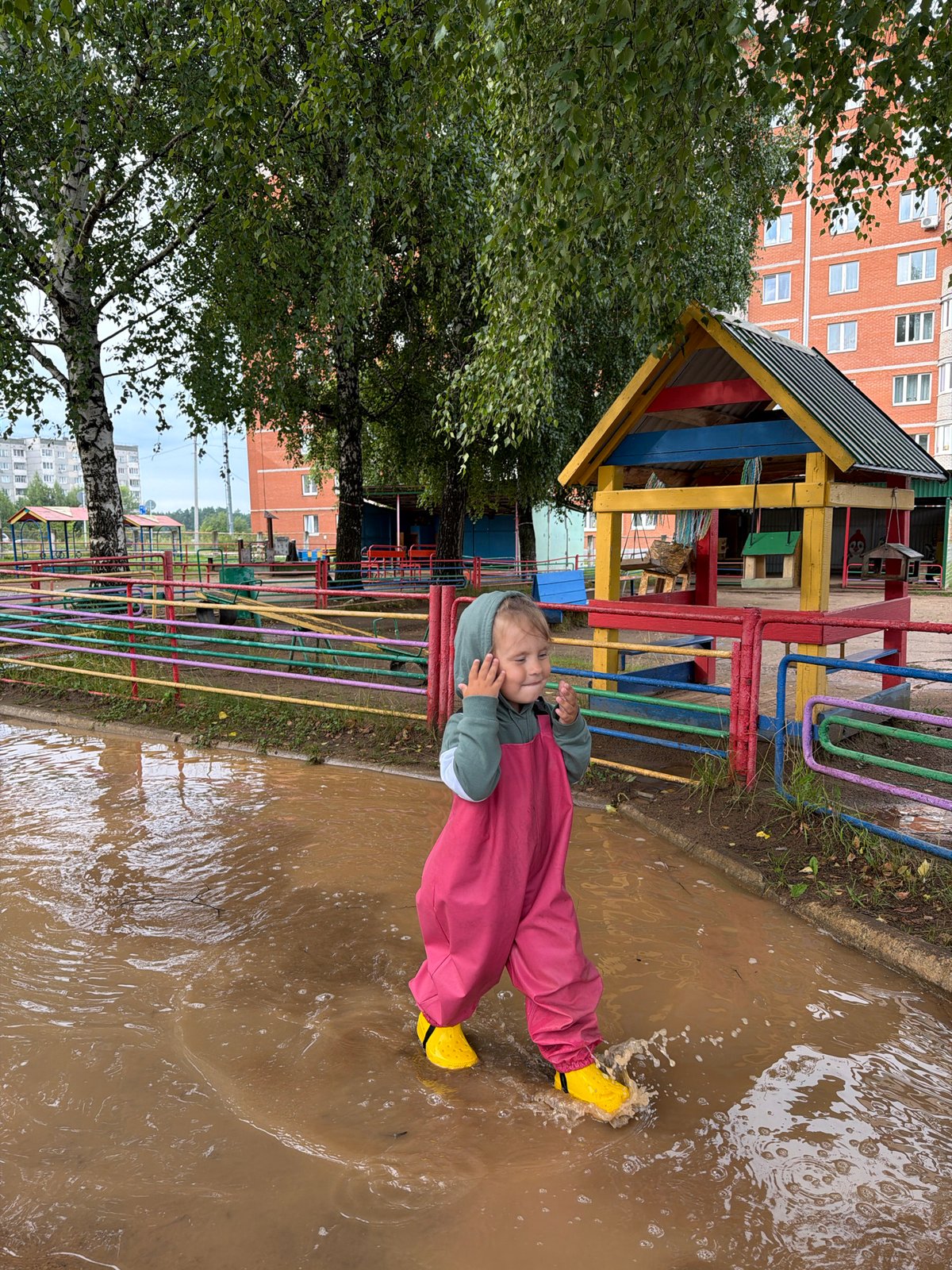 Rainy day puddle walk through Chaikovsky, Russia