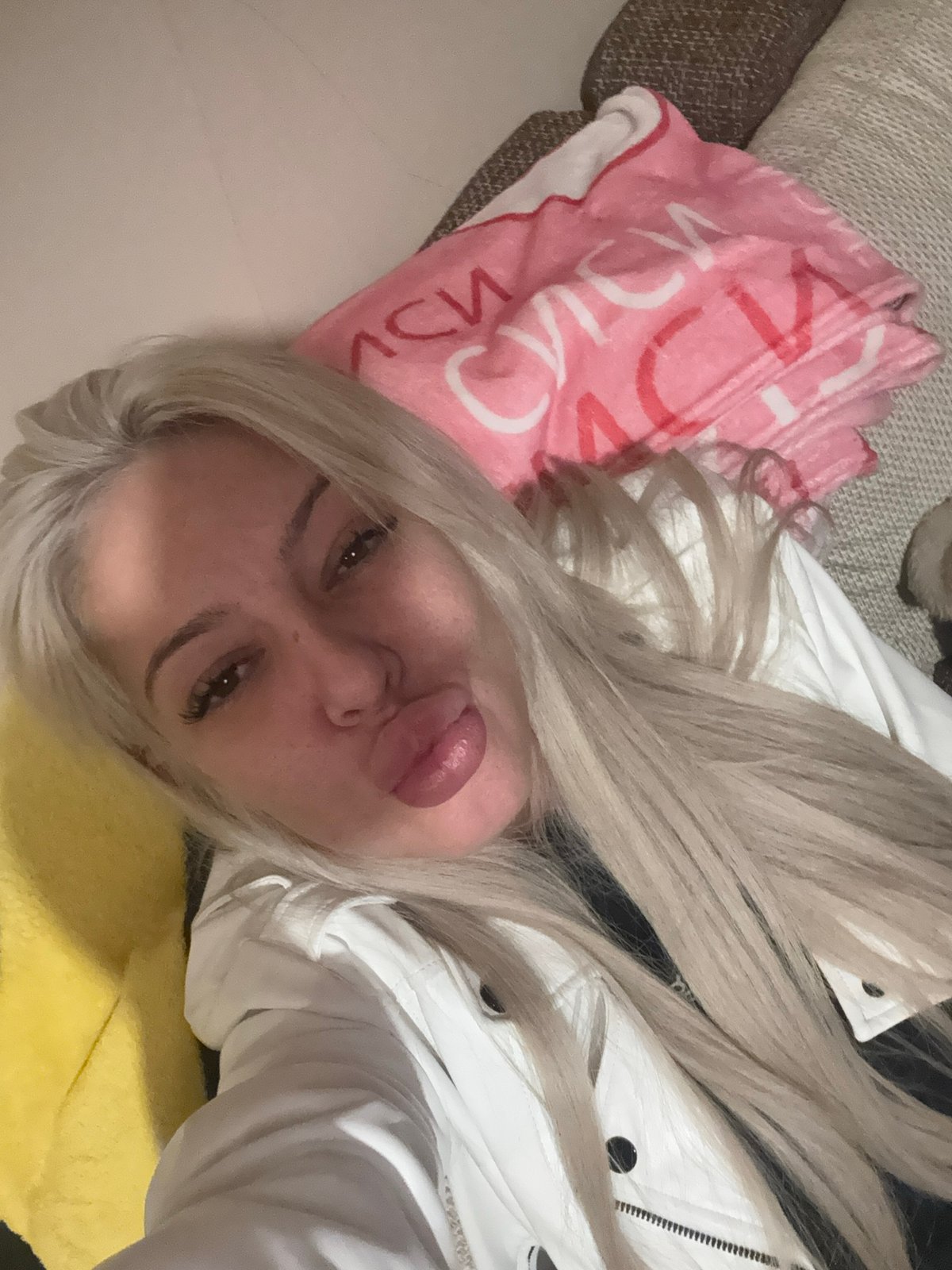 Woman photographed reclining indoors in Plovdiv, Bulgaria