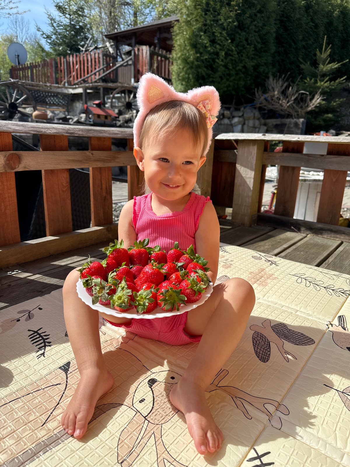 Toddler enjoys sunny morning playtime in Wisła, Poland