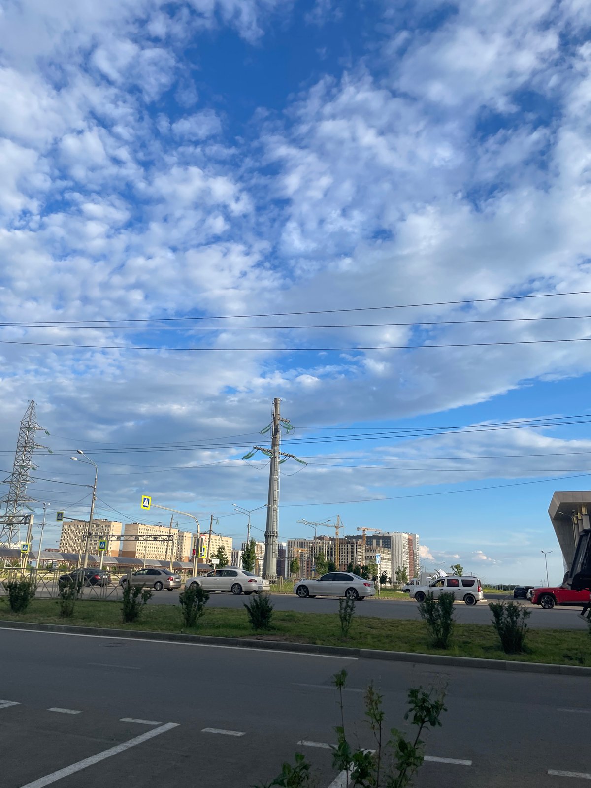 Afternoon street life around a Stavropol commercial district