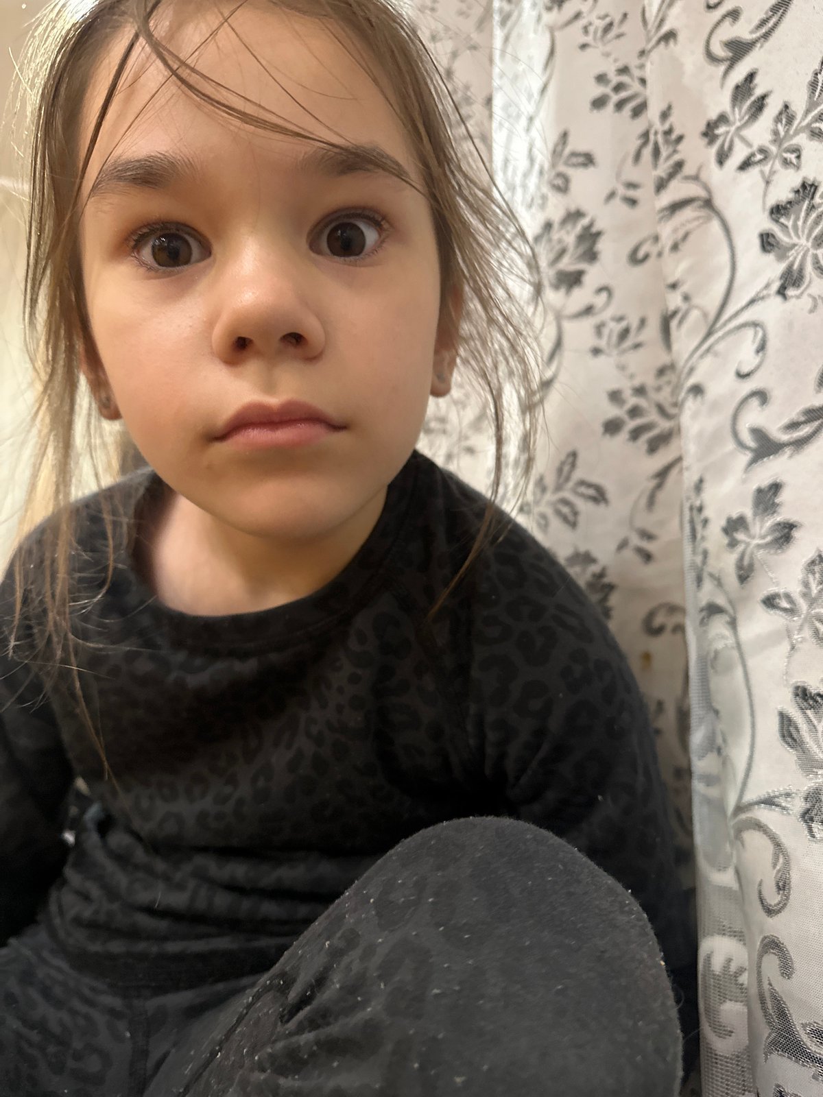 Young girl photographed in indoor portrait session in Uva, Russia