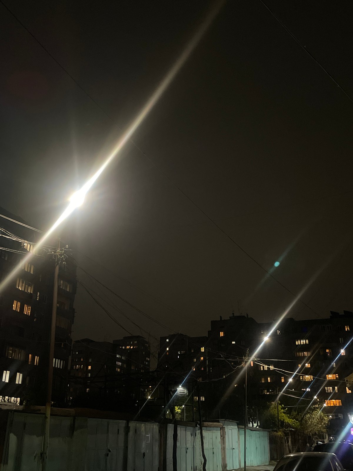Evening lights illuminate Yerevan residential buildings and streets