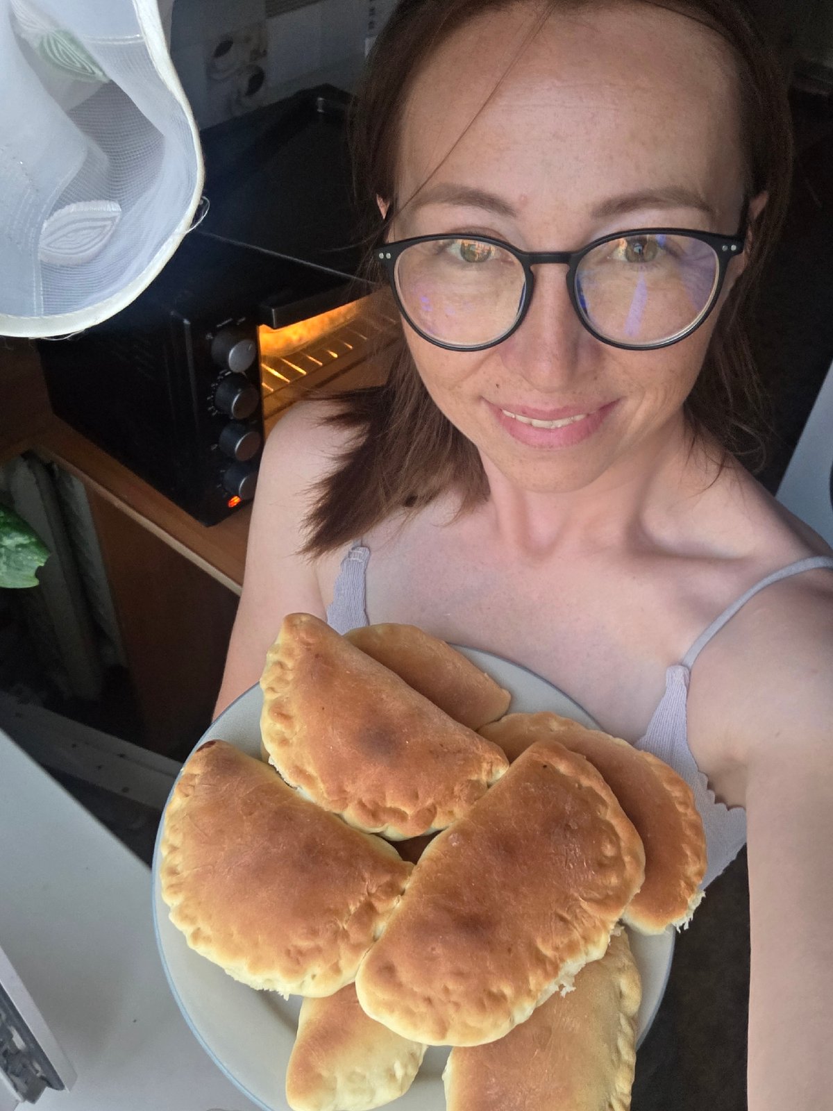 Lazy afternoon at home with a cat and fresh pastries