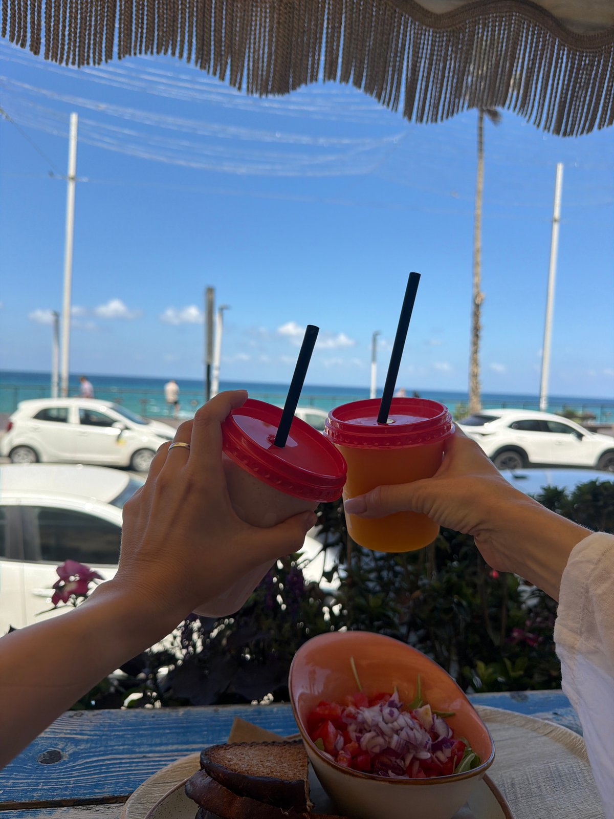 Plastic cup toast in Bat Yam, Israel