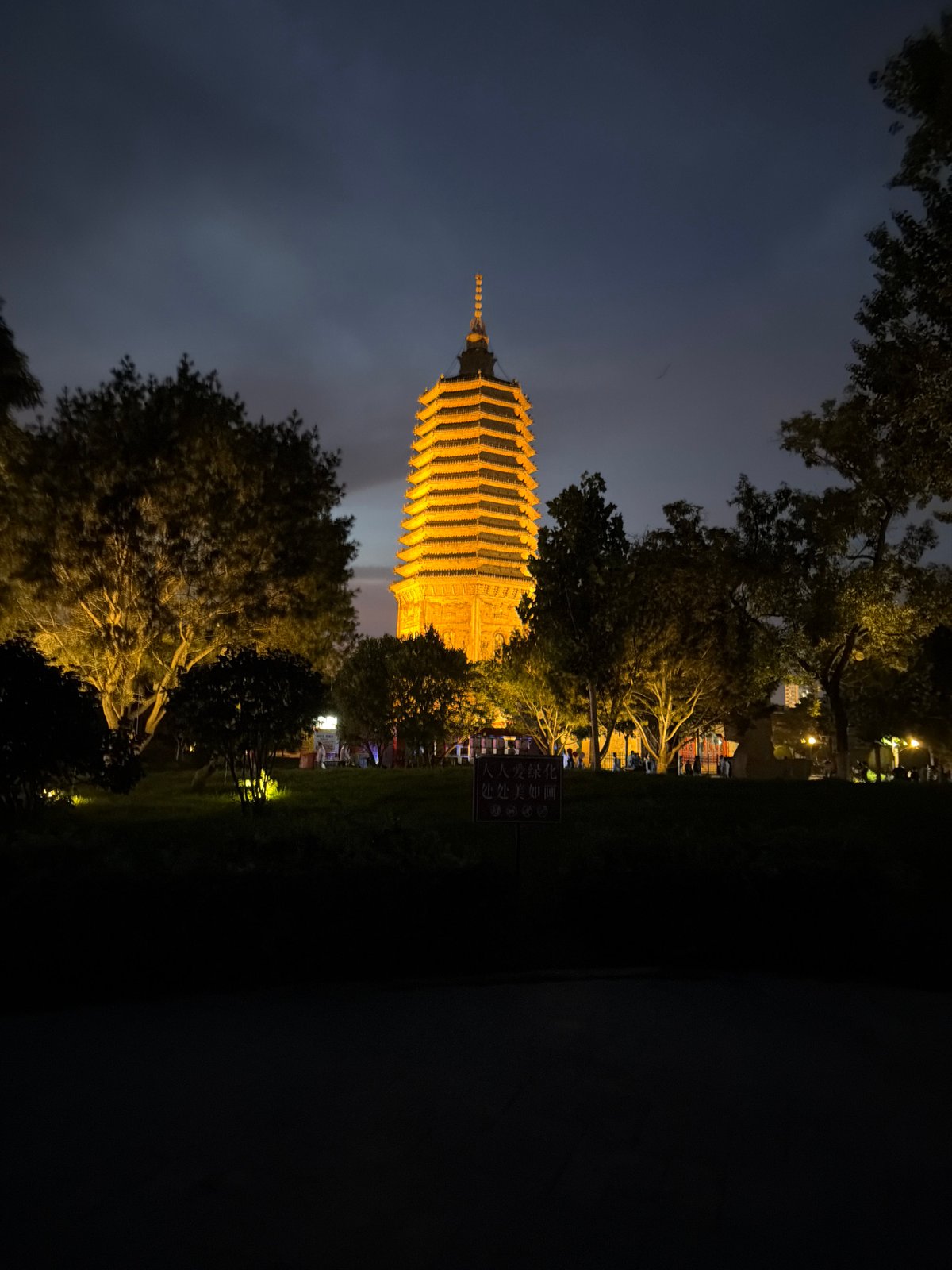 Jinzhou after dark: landmarks, traffic, and plaza dancing