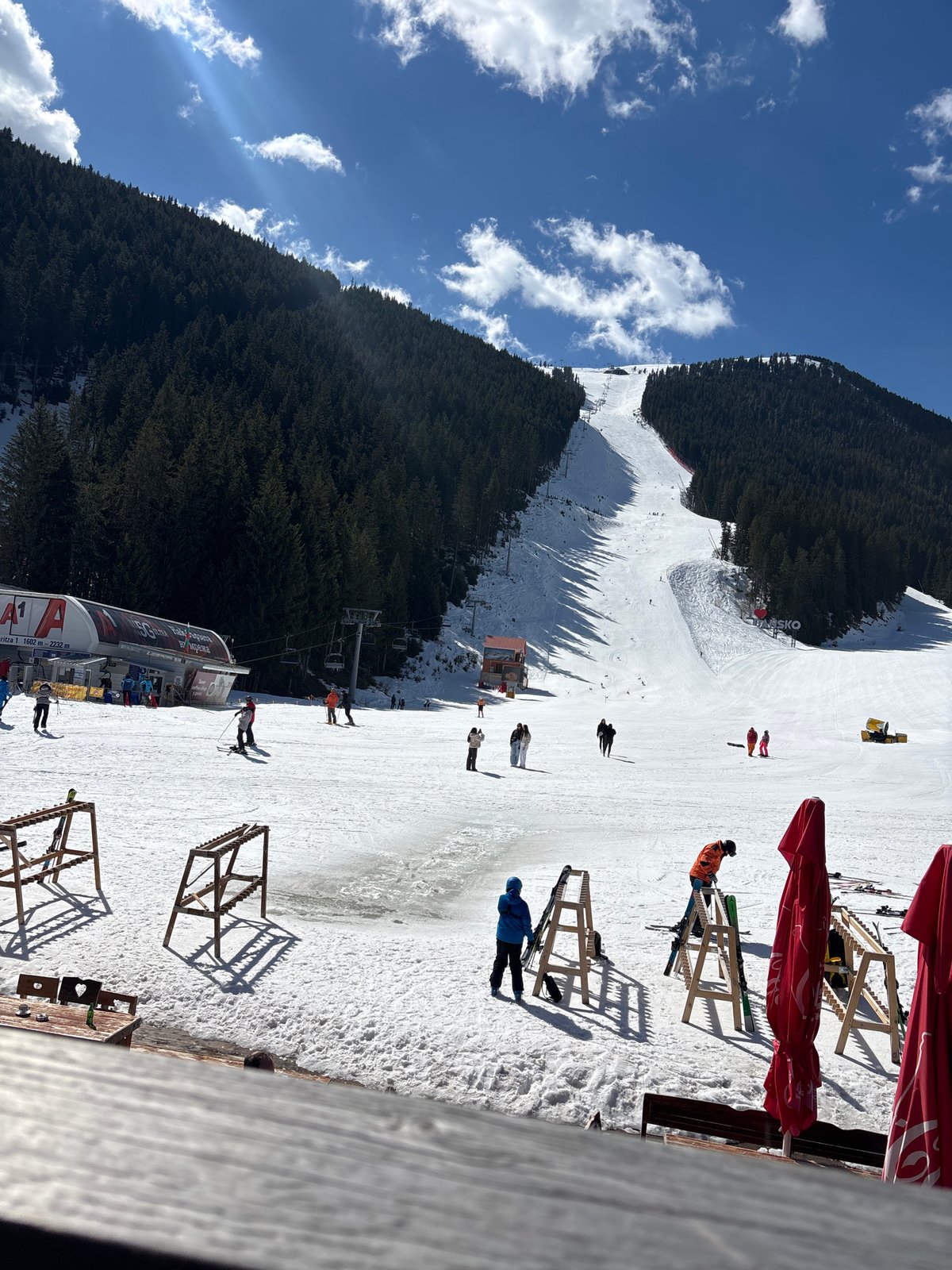 Sunny day skiing scene captured at Bansko resort