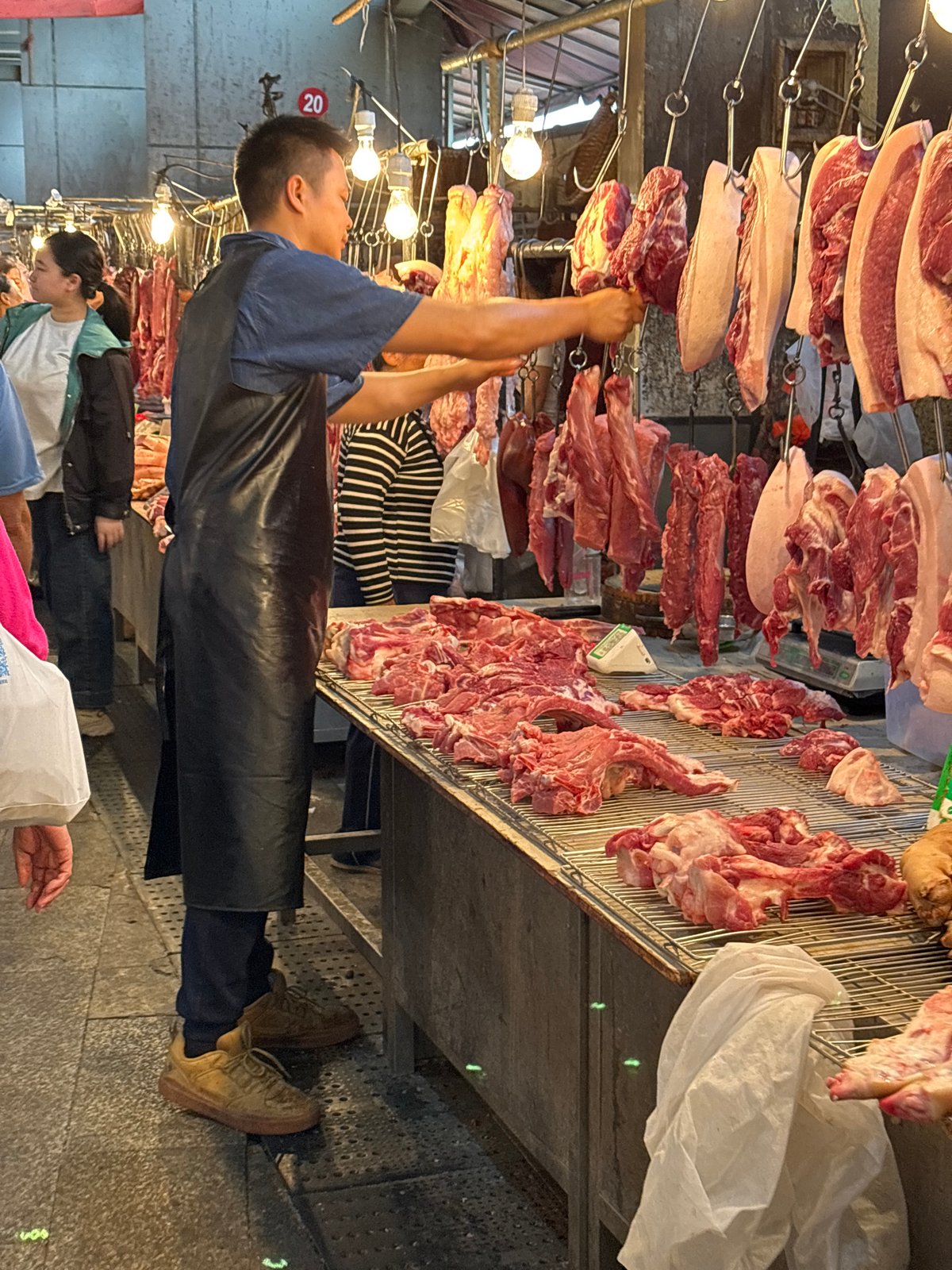 Morning market activity documented in Jiangjin, China