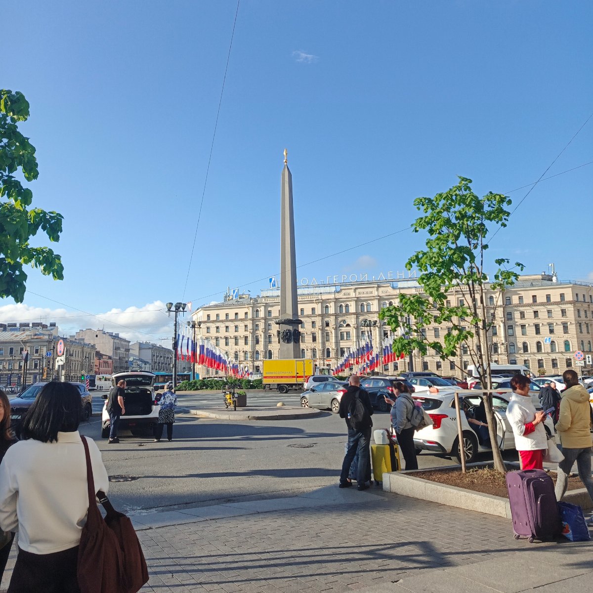 Obelisk monument documented in Saint Petersburg plaza scene