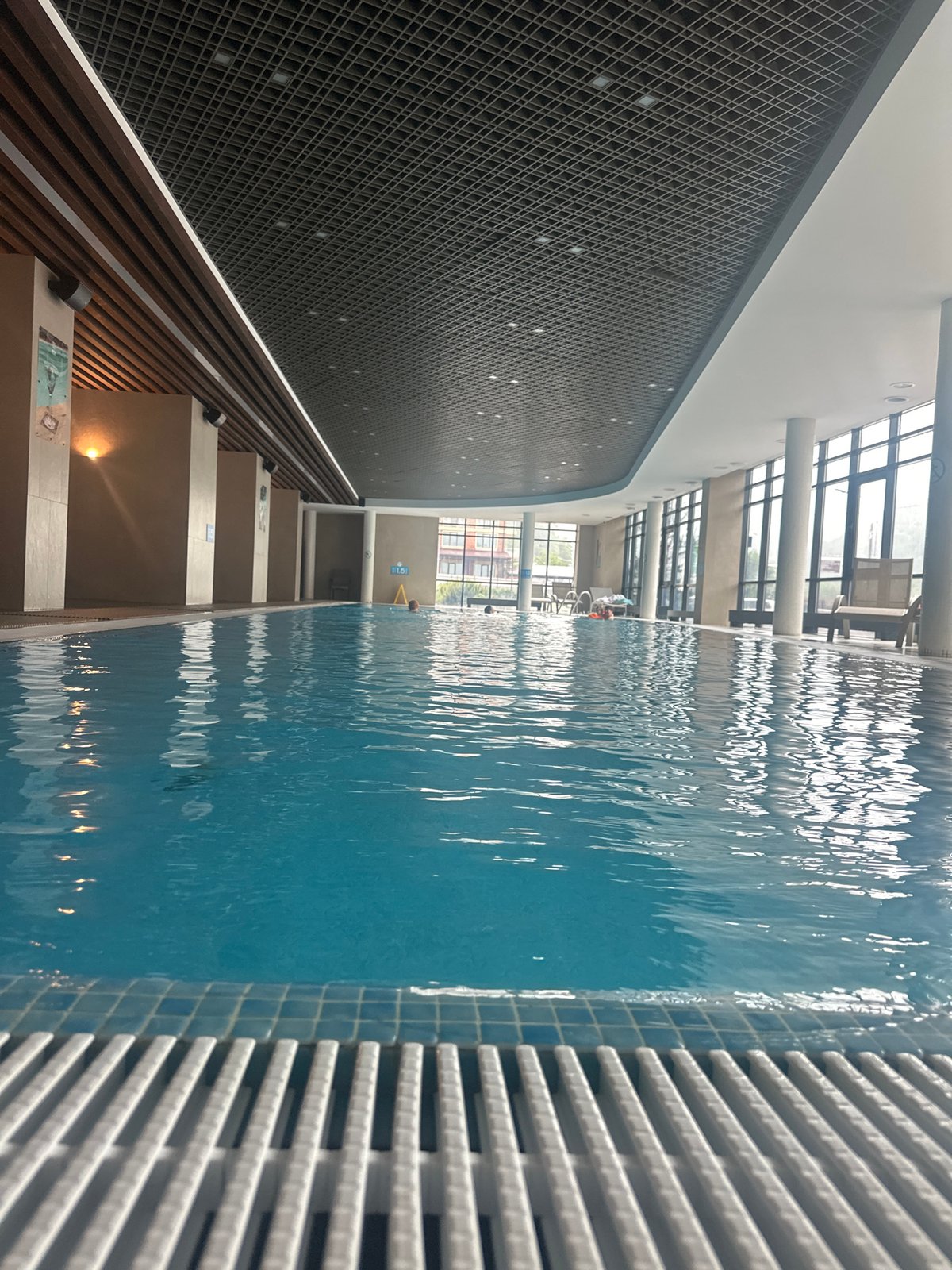 Resort guests enjoy indoor amenities during rainy morning in Estosadok