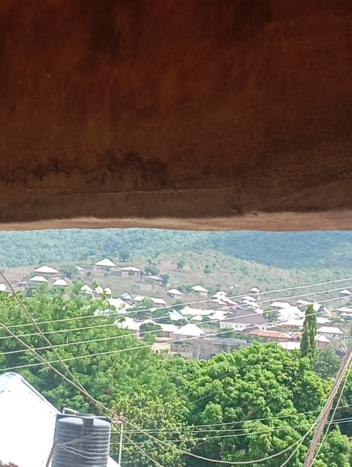 Hillside residential community documented from multiple perspectives over 10 minutes