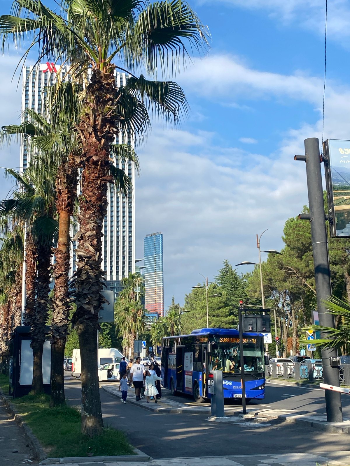 Afternoon stroll along Batumi's palm-lined boulevard