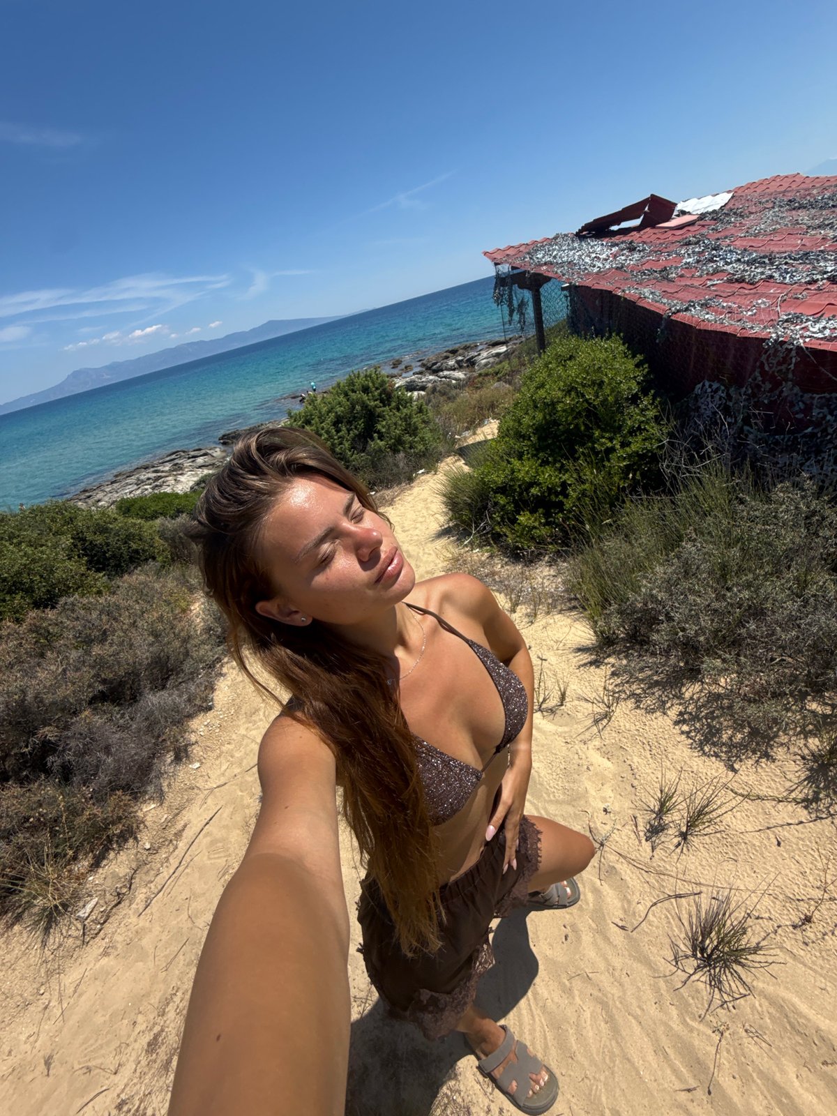 Beach day selfies and coastal scenes from Nea Peramos, Greece