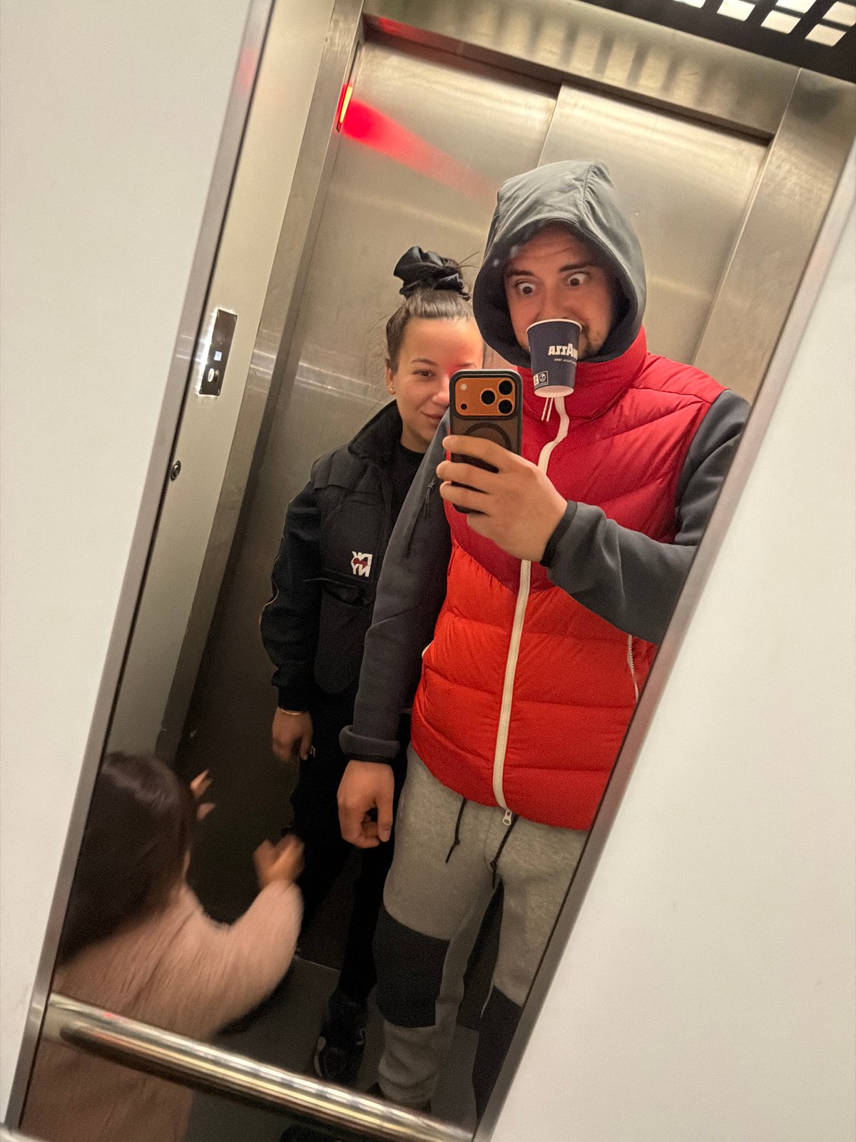 Family takes elevator selfie in brief recorded moment