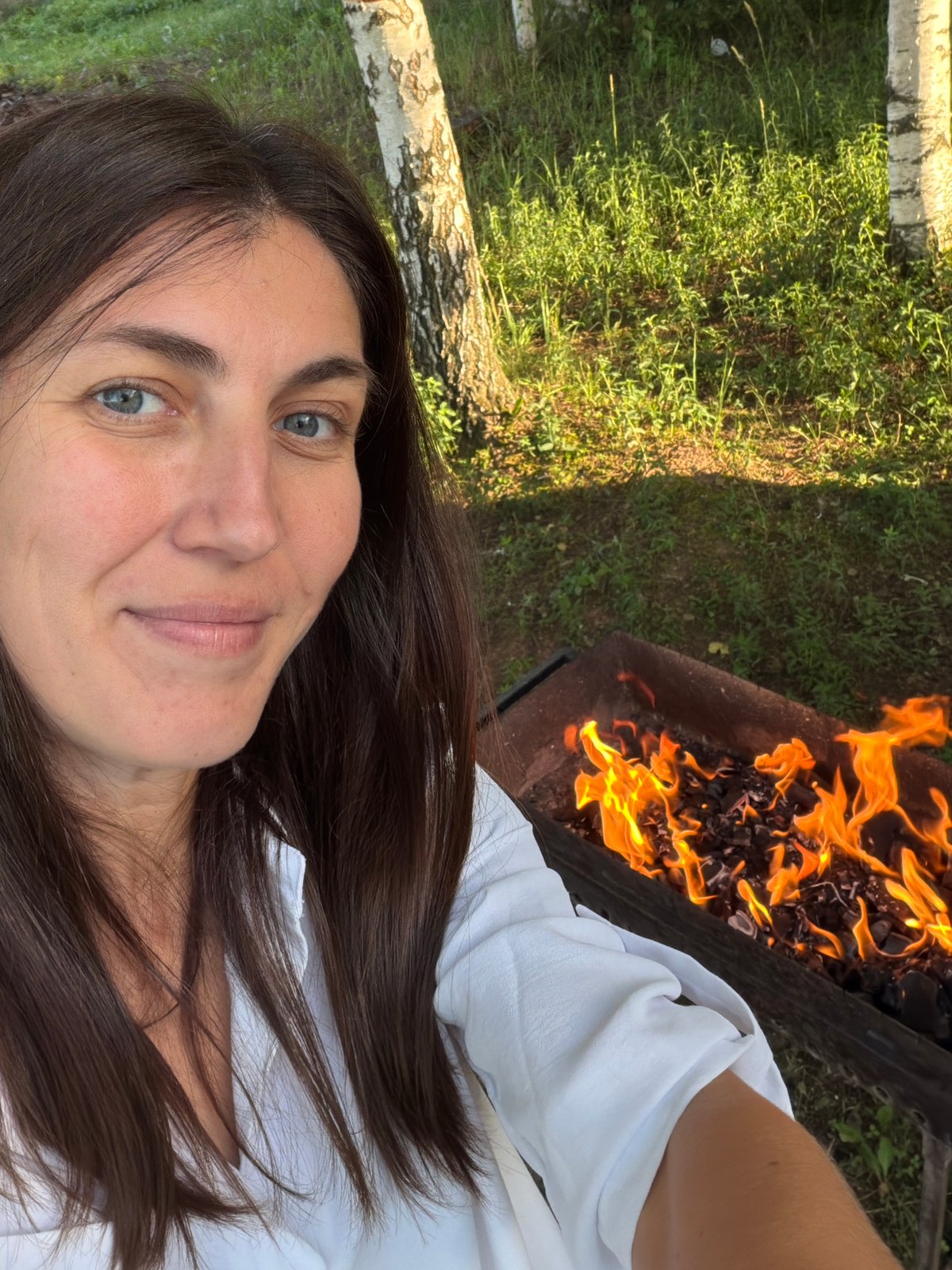 Backyard grill day by the water in Dubrova, Russia