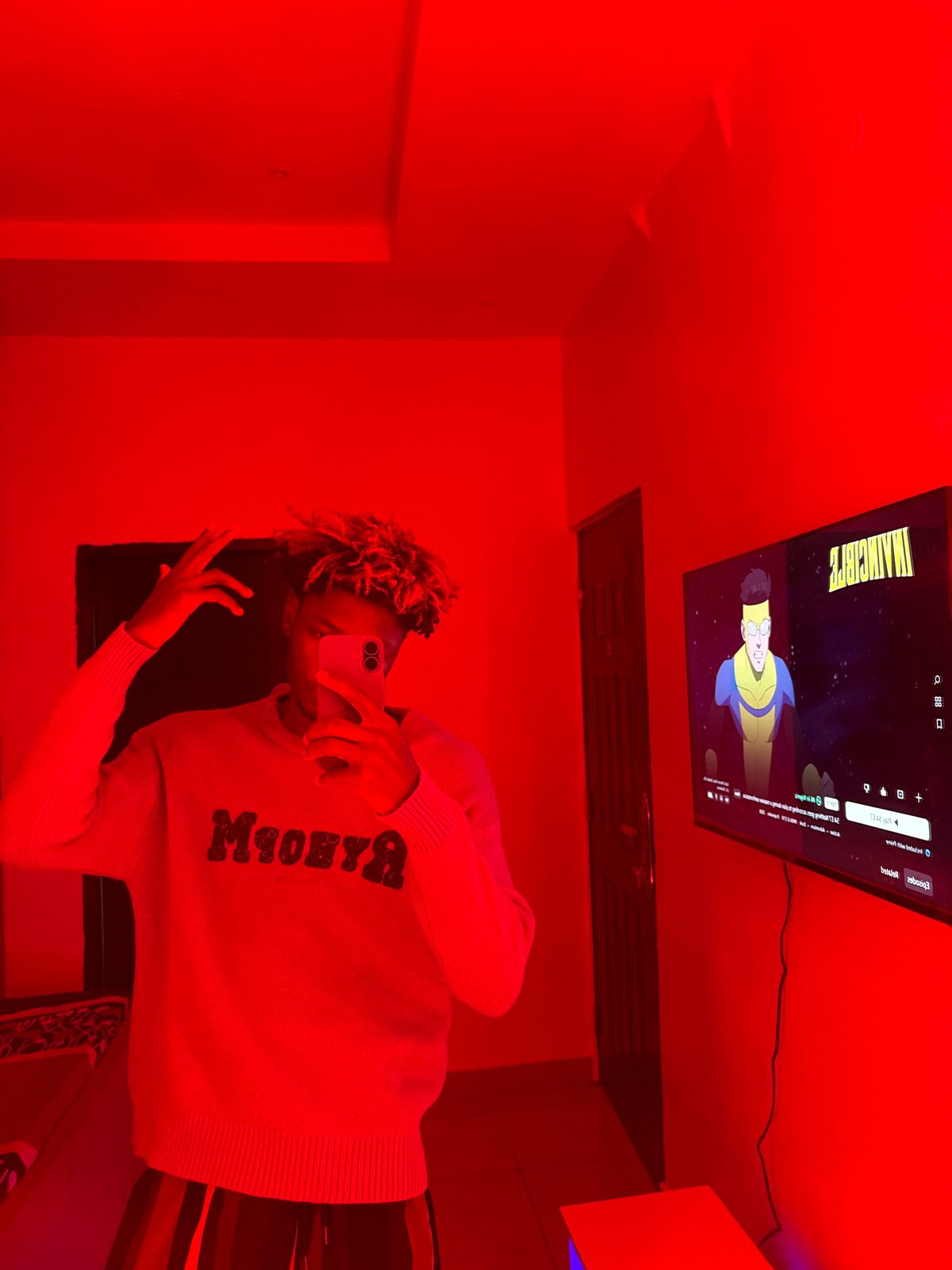 Indoor selfie, outdoor storm clouds captured in Igboefon