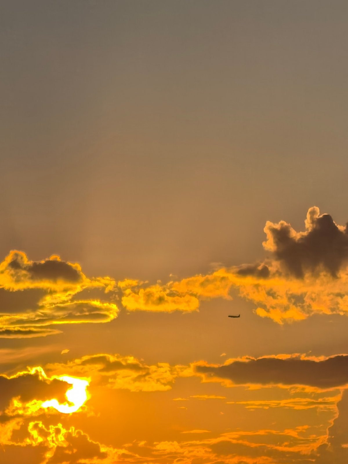 Sunset from multiple angles, clouds and warm skies all around