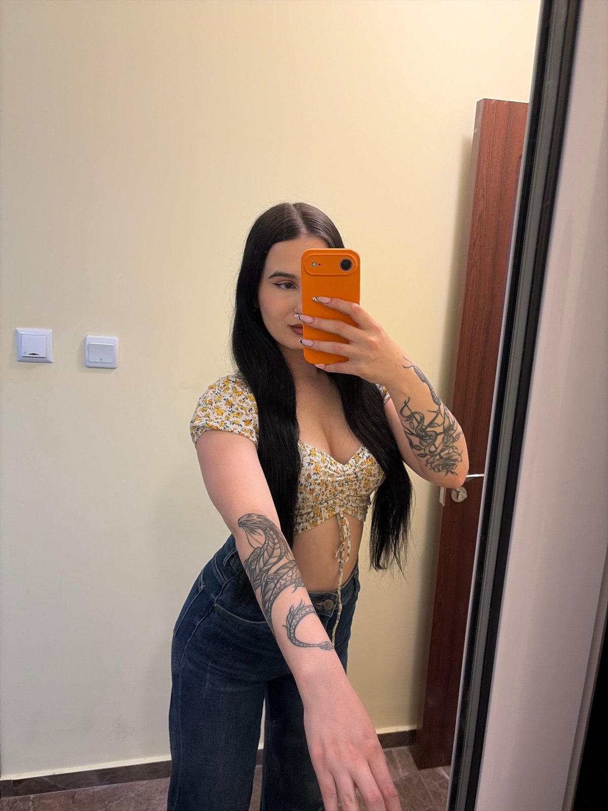 Woman takes mirror selfie in Sofia apartment