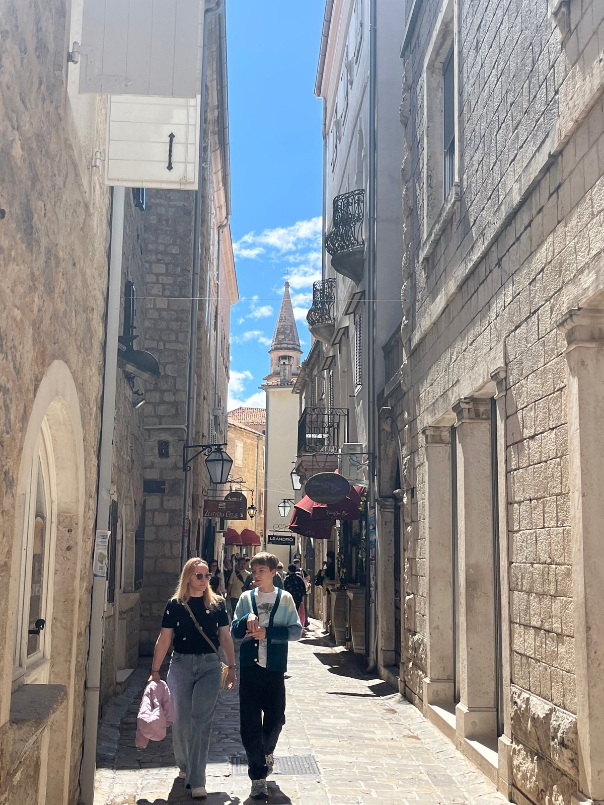Woman with flute spotted in Budva's historic old town