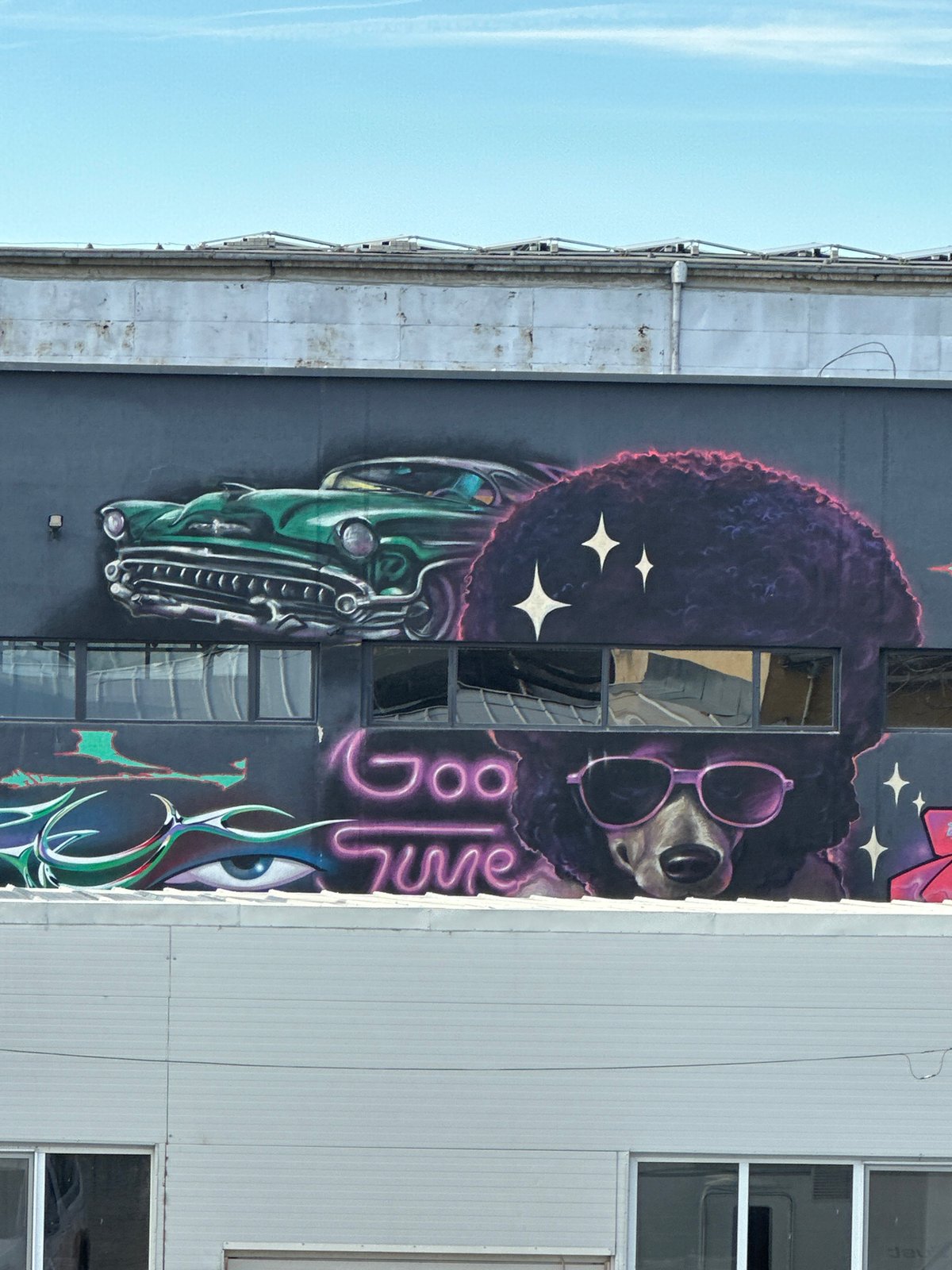 Retro mural with classic car spotted on Sofia building