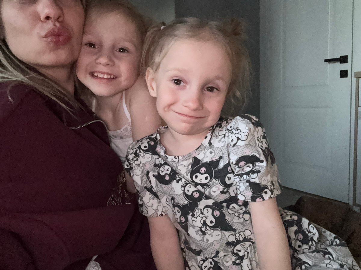 Family moment captured indoors in Krasnoyarsk