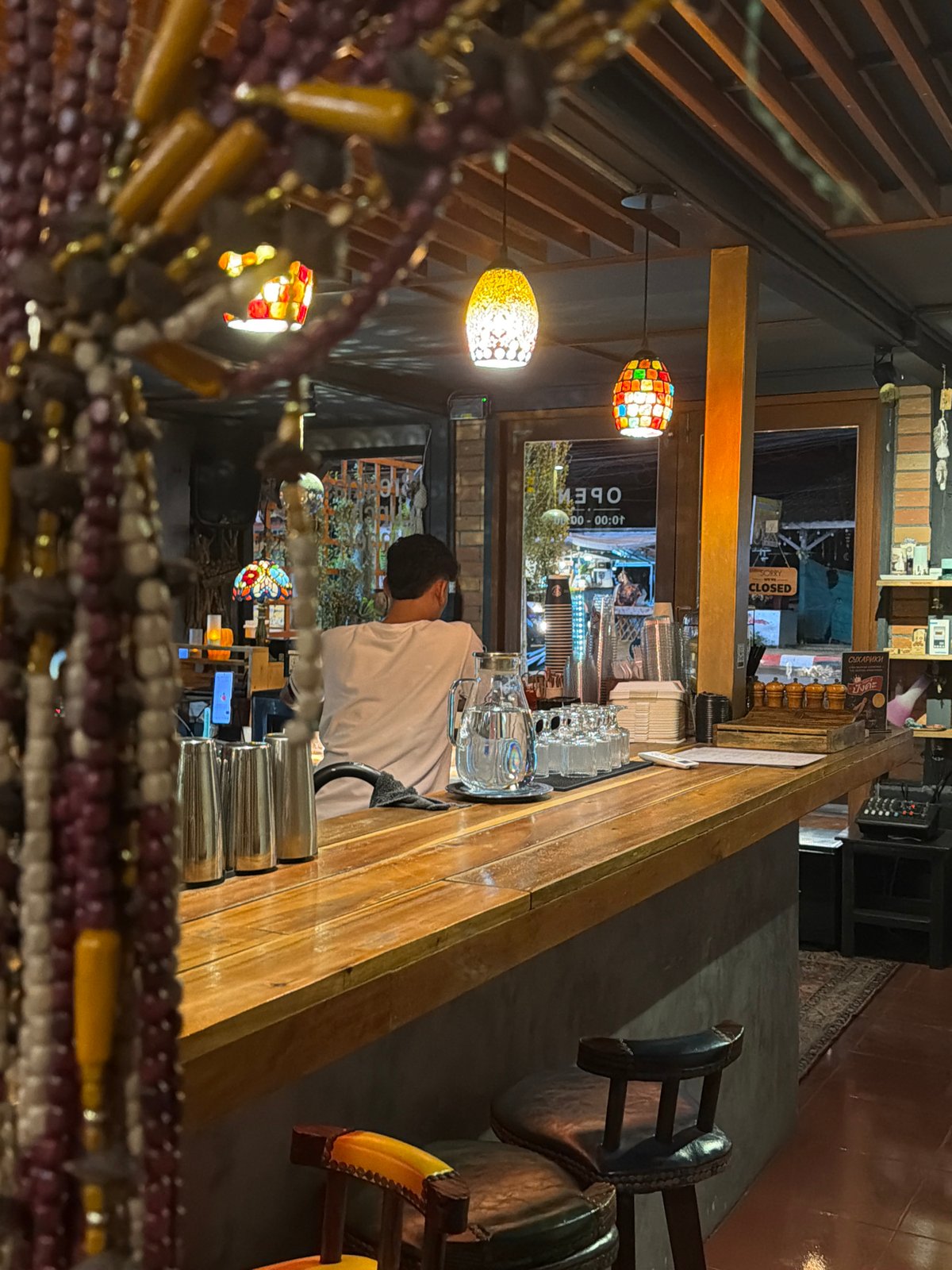 Bar interiors and stormy night skies in one afternoon