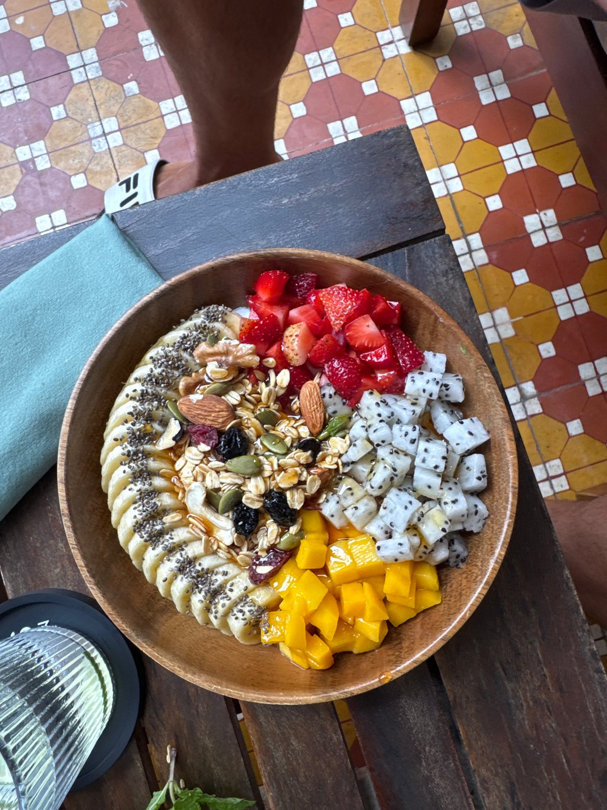 Tropical fruit breakfast preparation documented in Đà Nẵng cafe