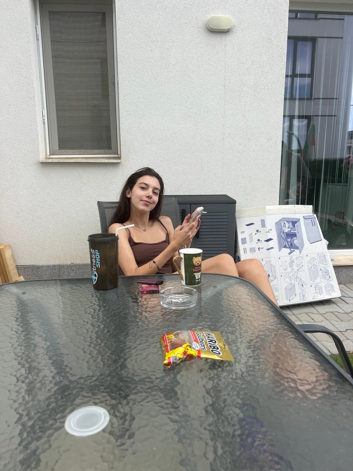 Afternoon hangout at a modern apartment complex with a dog