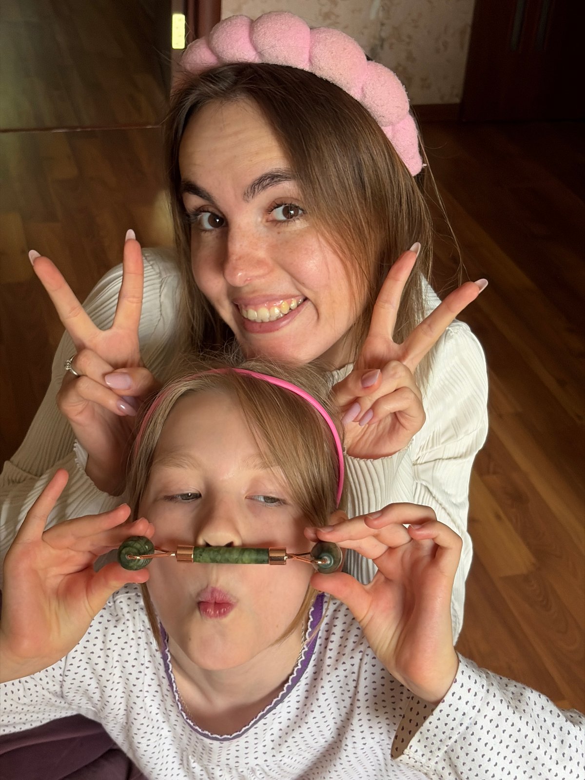 Mother-daughter playtime captured in Izhevsk home Friday morning