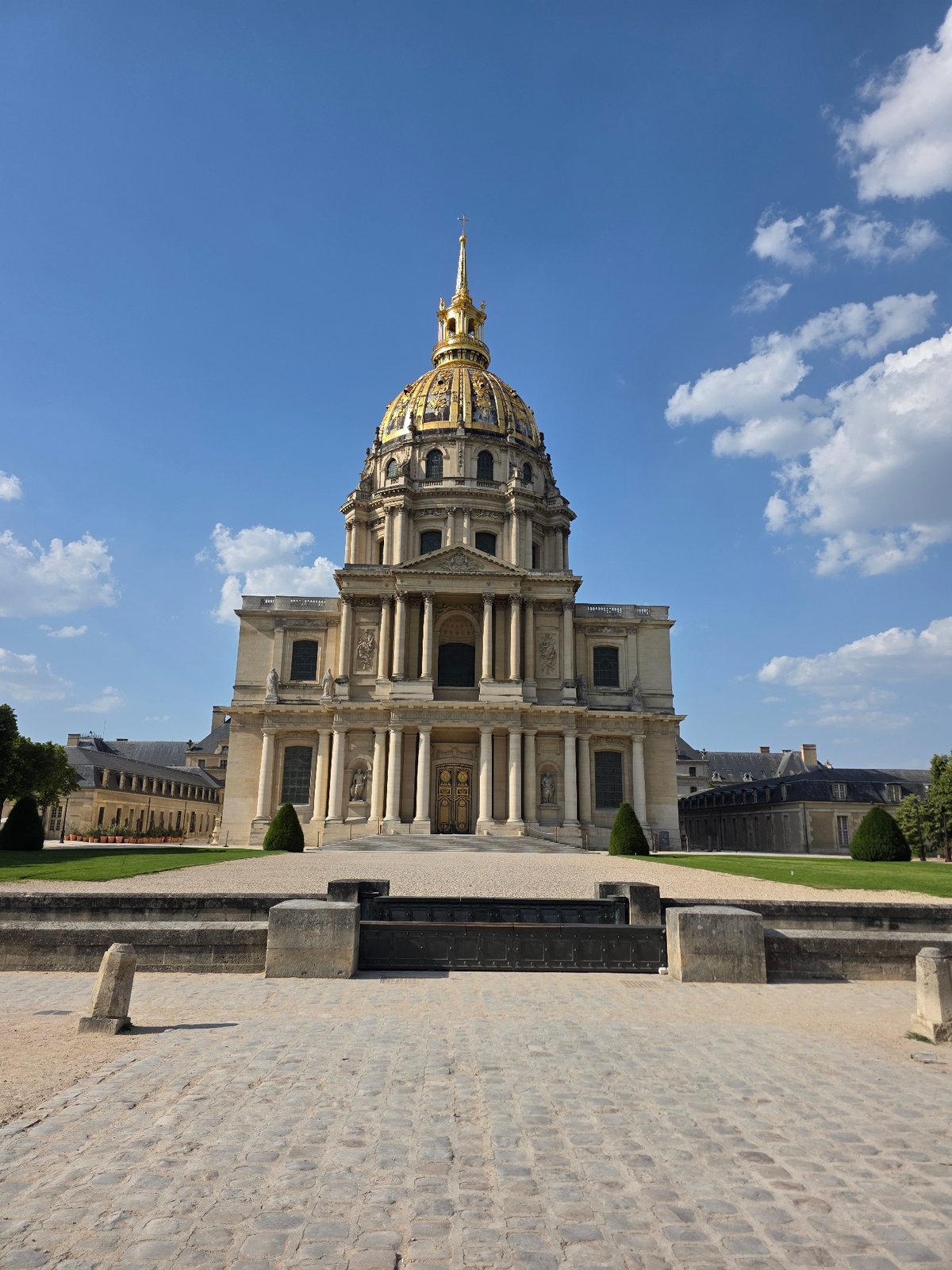 Close looks at the golden dome of Les Invalides, Paris