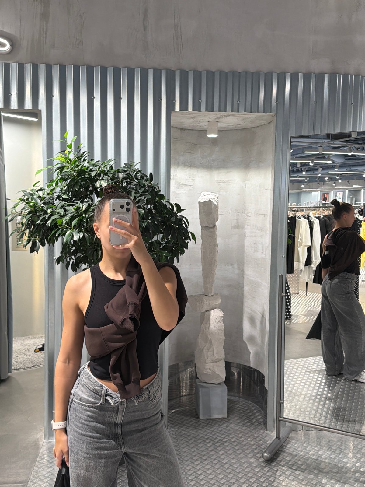 Fitting room mirror selfies at a Moscow boutique
