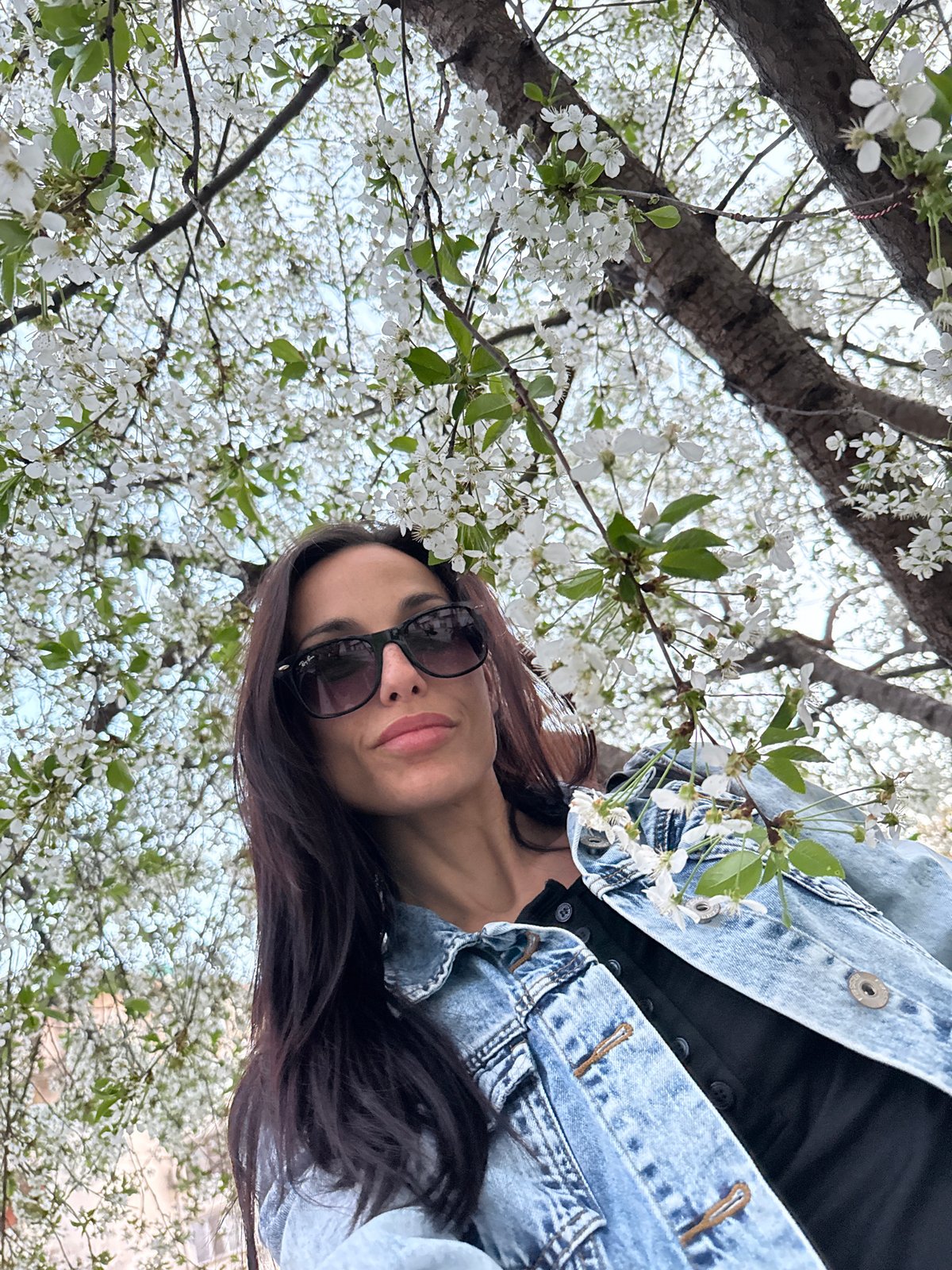 Woman photographs herself outdoors and indoors in Pleven, Bulgaria