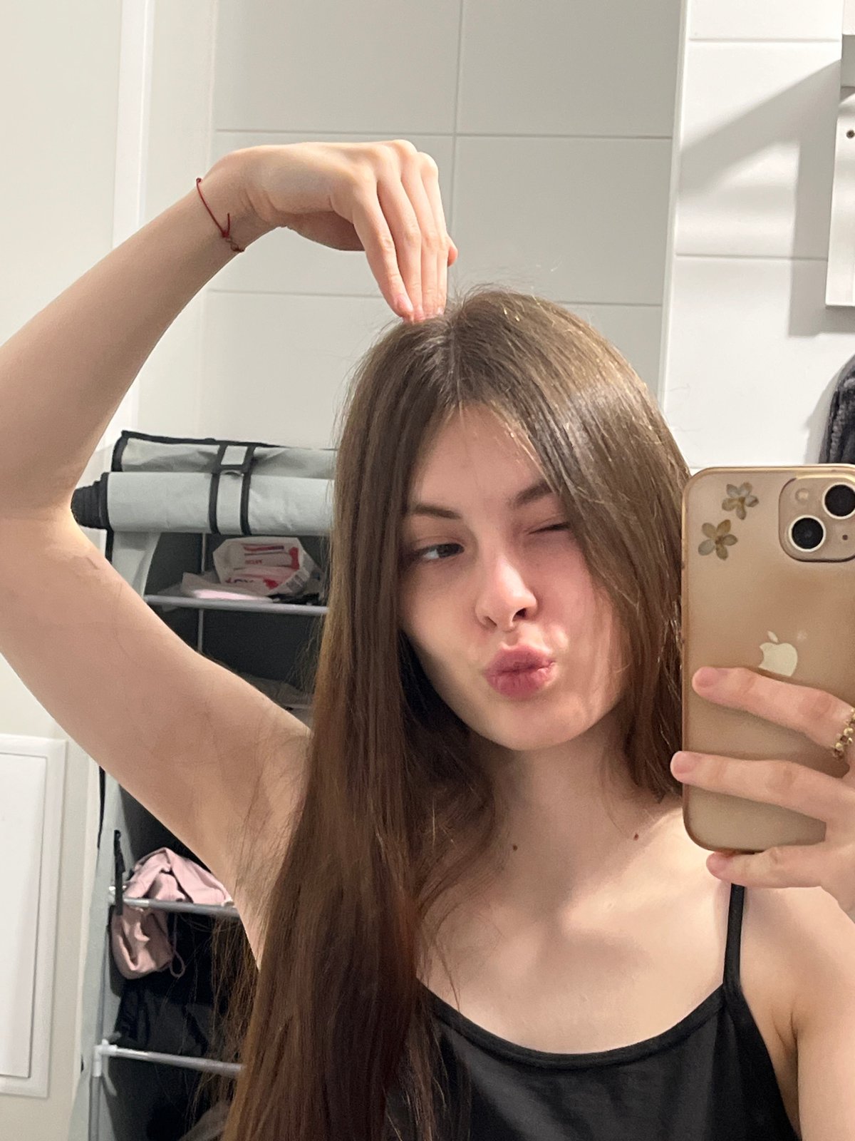 Woman documents cat bath session in Saint Petersburg bathroom
