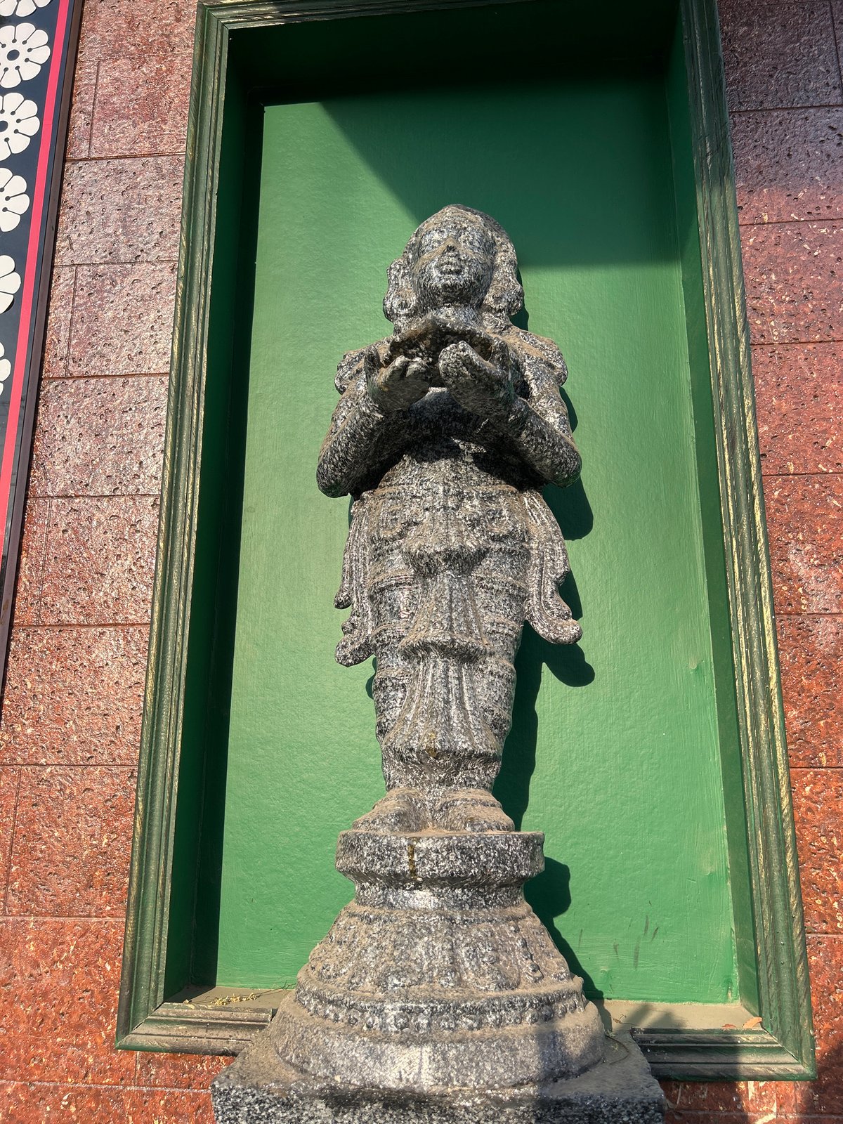 Religious sculptures and decorative archway documented in Puttaparthi