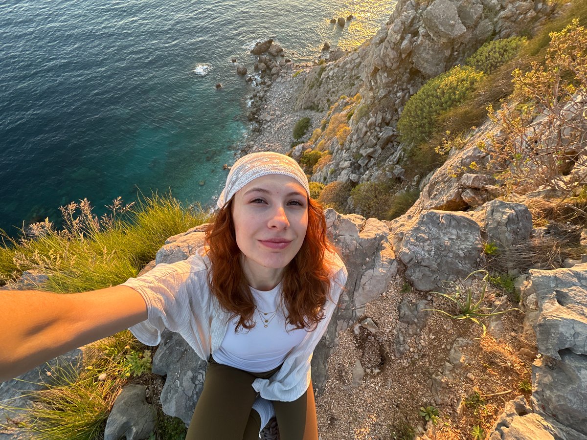 Tourists document afternoon activities in coastal Montenegro resort town