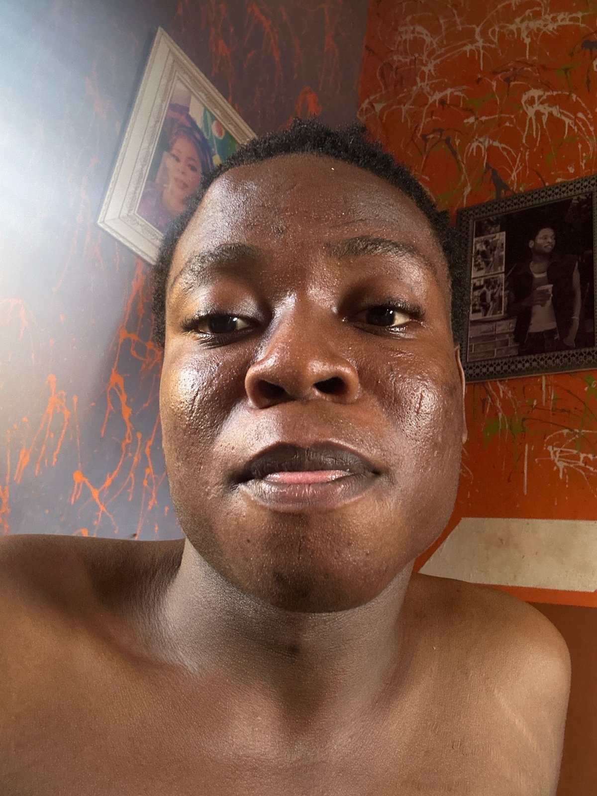 Person documents playful selfie session with household products