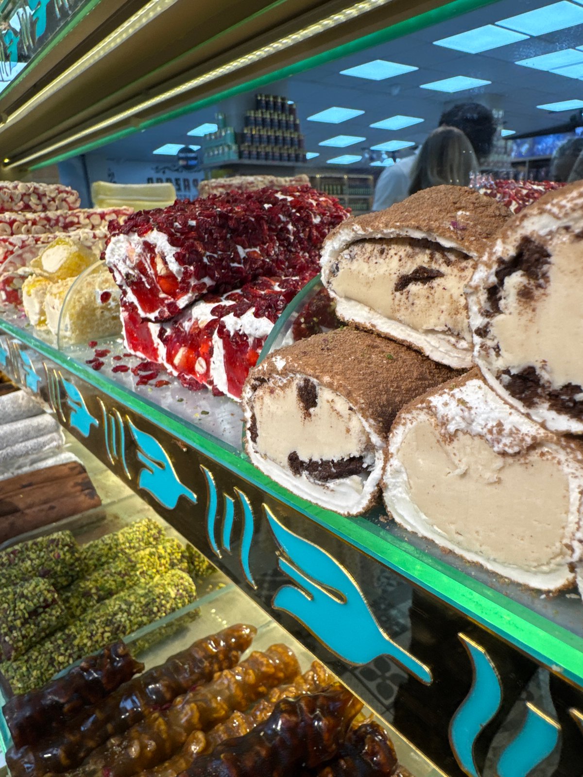Turkish sweets shop serves customers in Uçhisar Beldesi