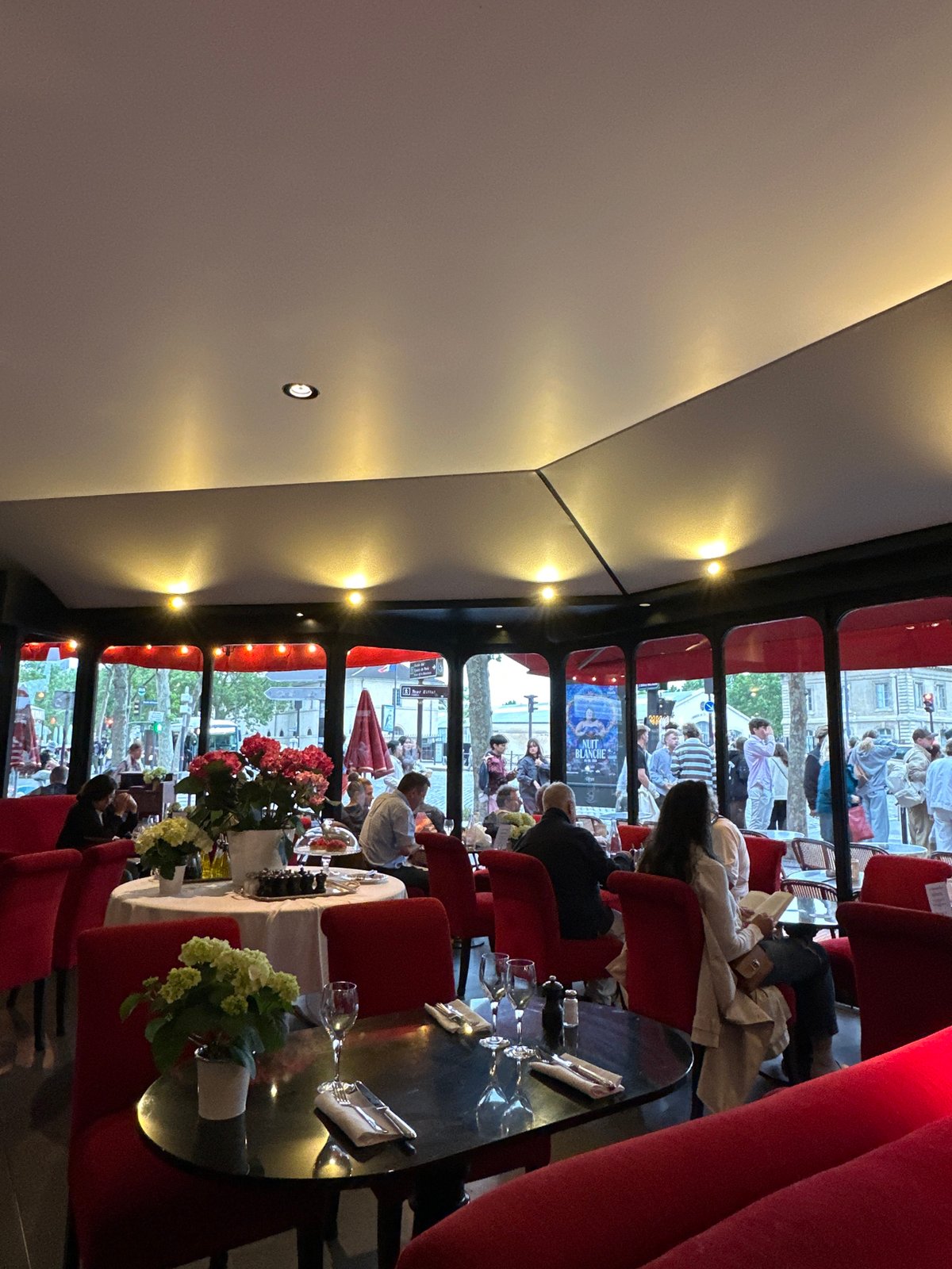 Evening dining experience documented at upscale Parisian restaurant