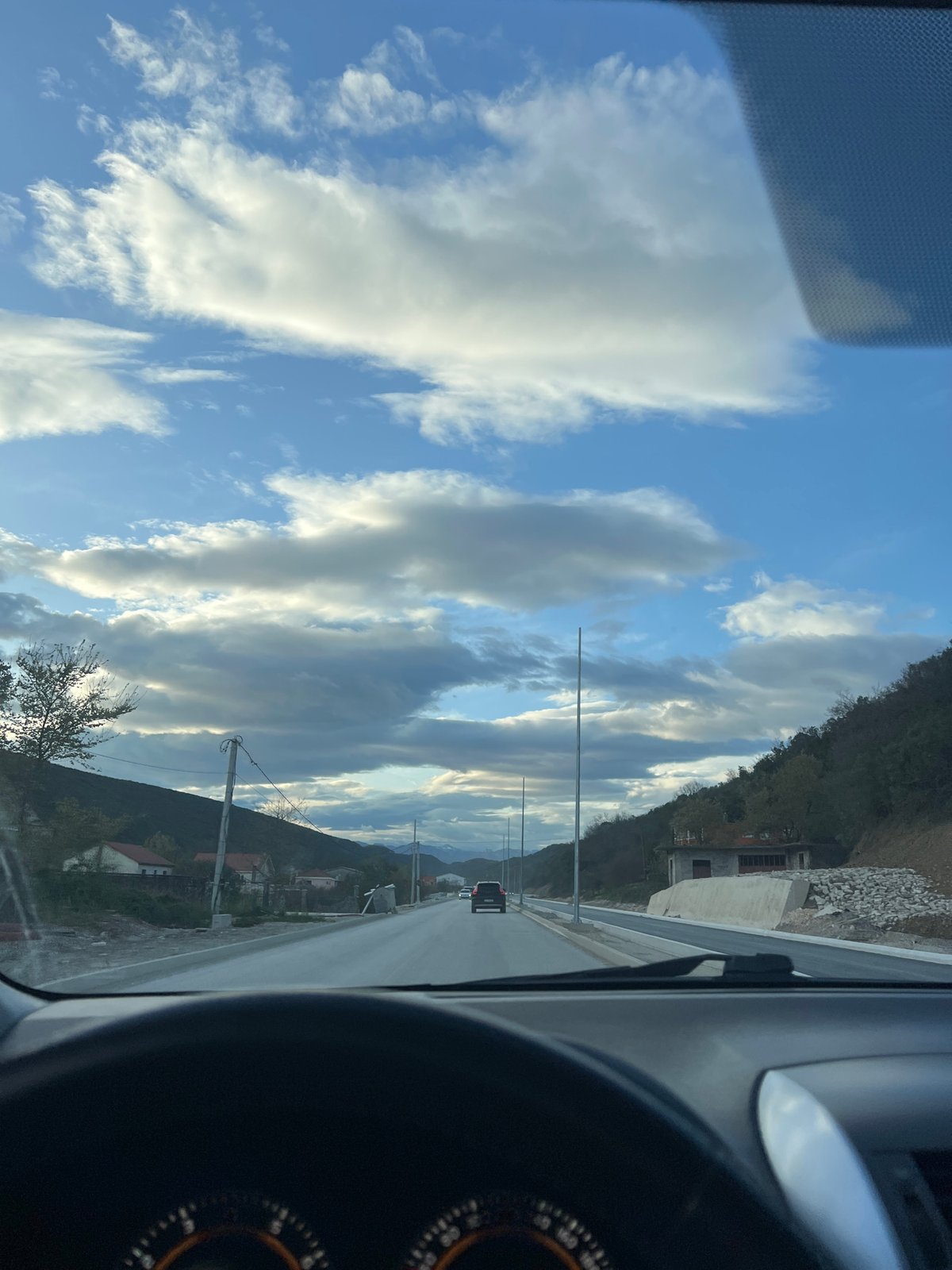 Driver captures industrial Montenegro landscape during brief afternoon journey