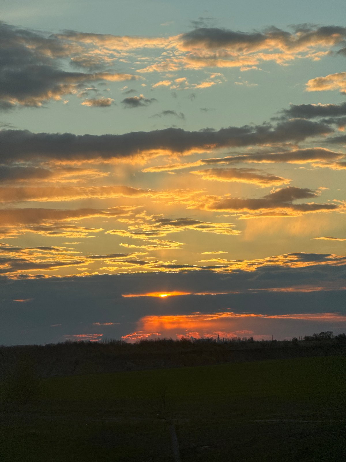 Dramatic sunset captured over rural Millerovo, Russia countryside