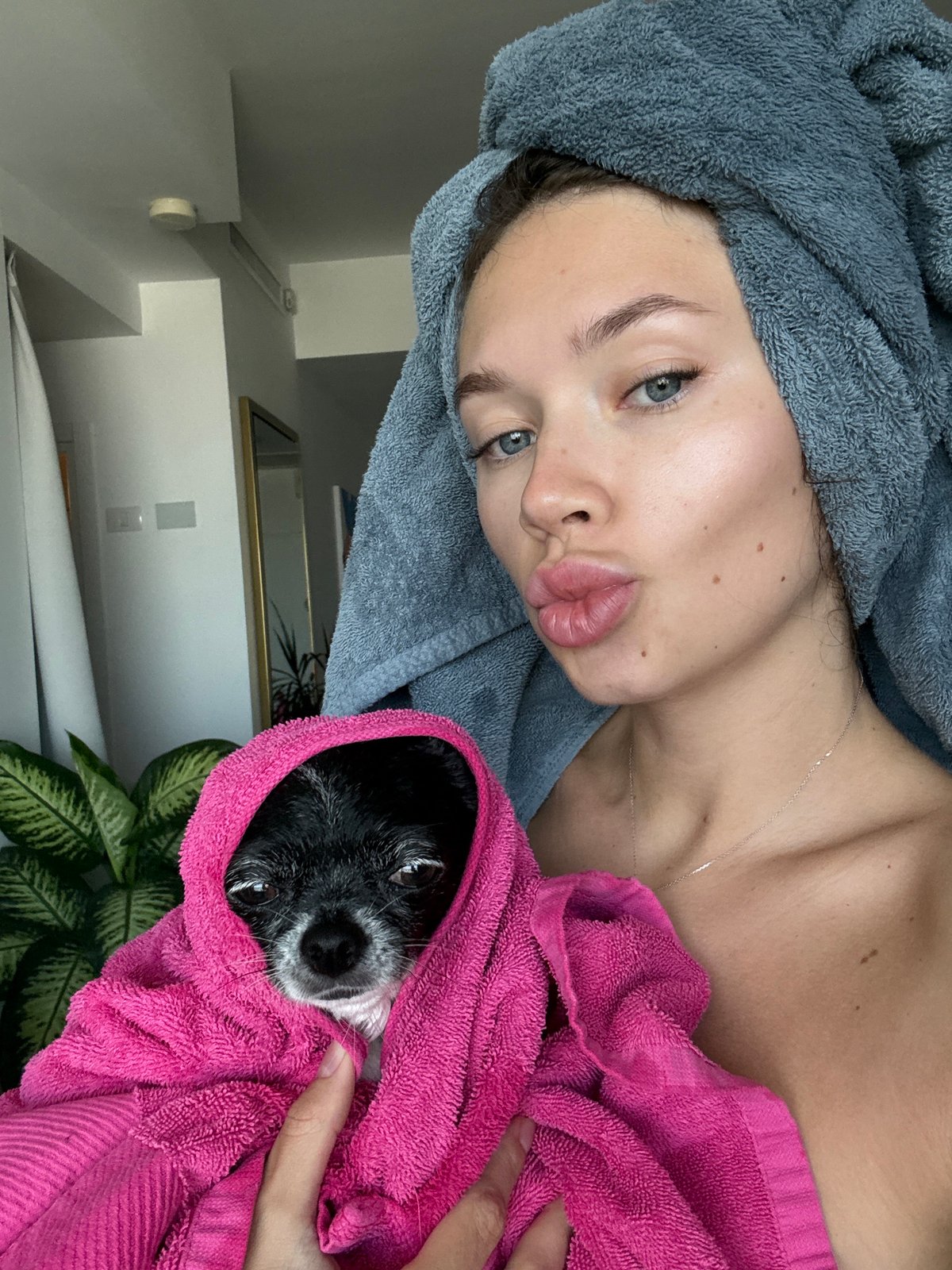 Post-bath towel selfie with a chihuahua mix in Tel Aviv