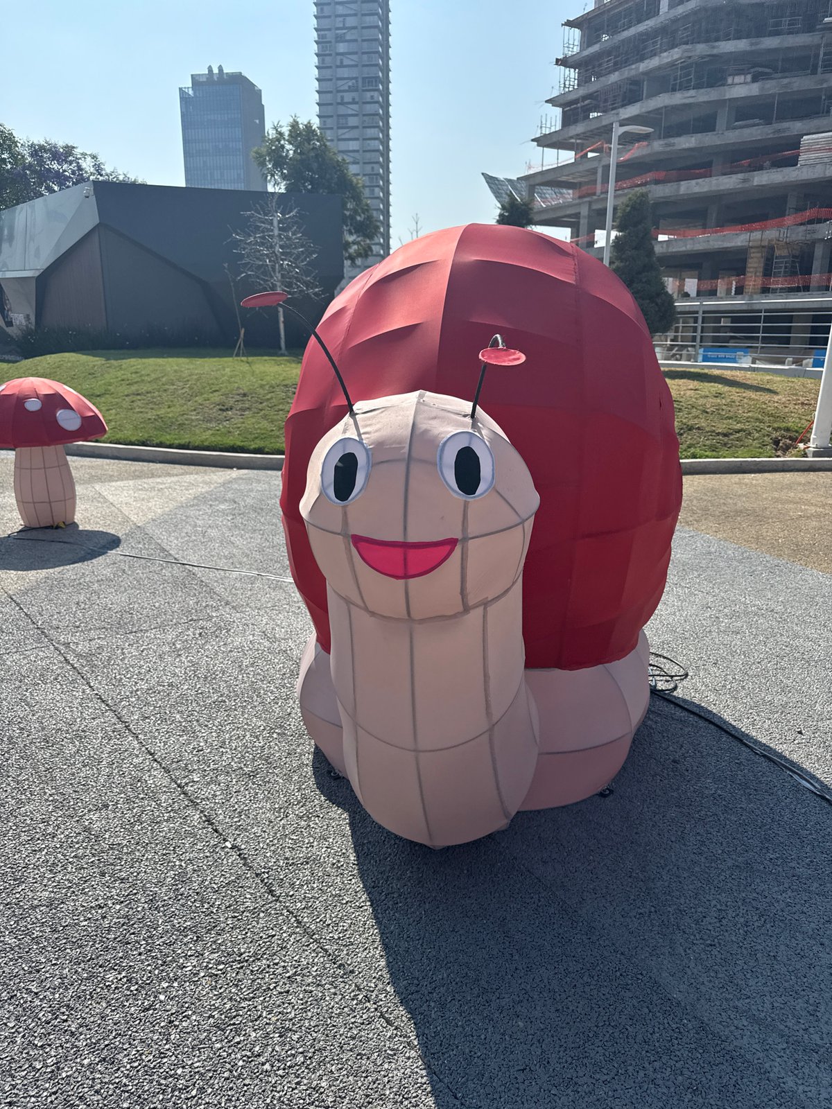 Whimsical animal sculptures displayed at Puebla park near Ferris wheel