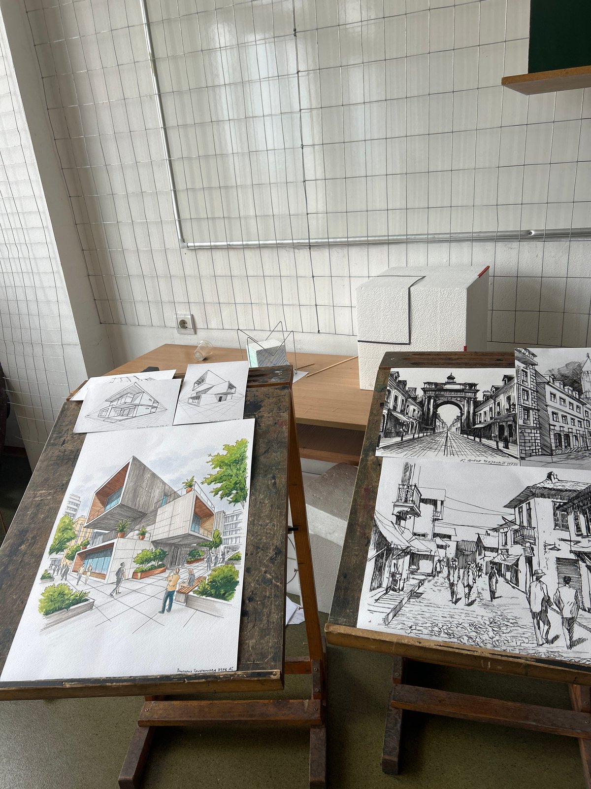 Architectural drawings displayed in Sofia studio space